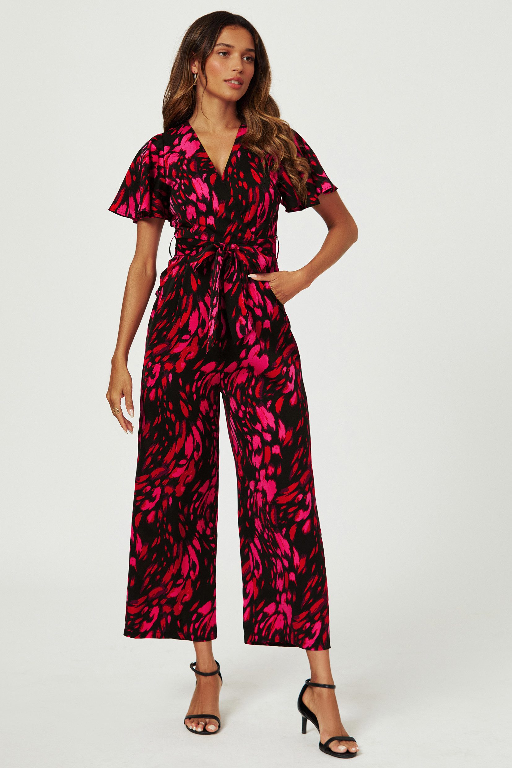 FS Collection Jumpsuit Damen Jumpsuit mit Wickeloberteil und weitem Bein (XS (EU:36 / UK:8) · S (EU:38 / UK:10) · M (EU:40 / UK:12) · L (EU:42 / UK:14) · XL (EU:44 / UK:16), 3 Farben: Rostrot, Schwarz, Grün) Wickeloptik, Statement-Print, elegante Silhouette
