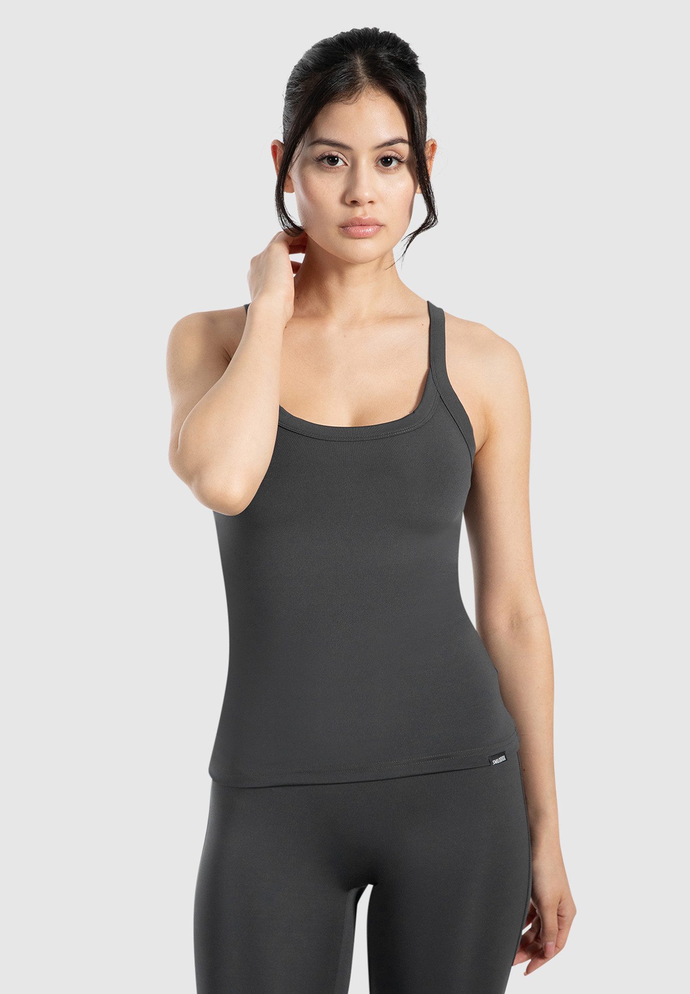 Tanktop Missie, figurbetontes Sporttop, schmale Träger, breiter Bundabschluss
