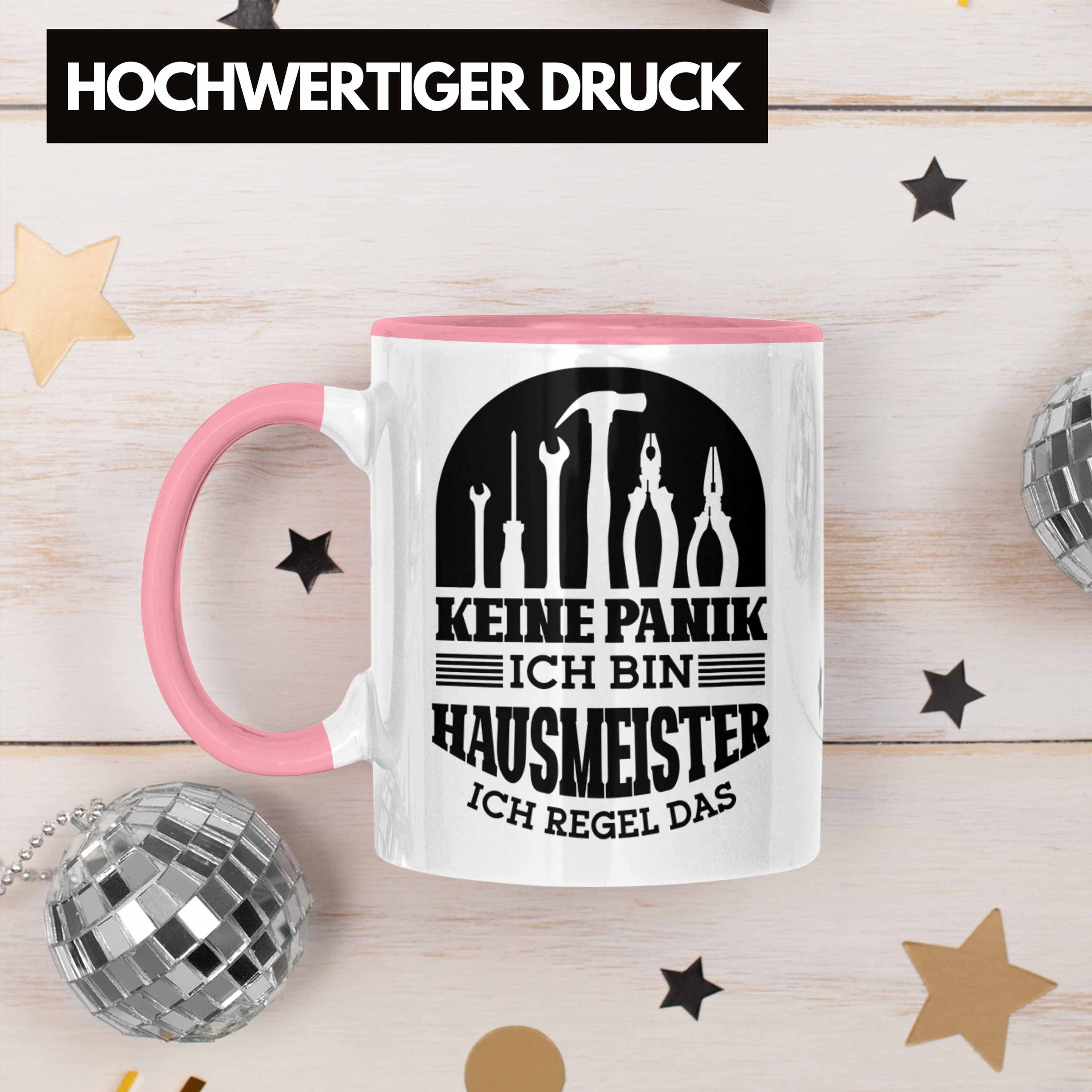 Trendation Tasse Lustiger Tasse Hausmeister Geschenk Geschenkidee Spruch Hausmeiste Rosa für
