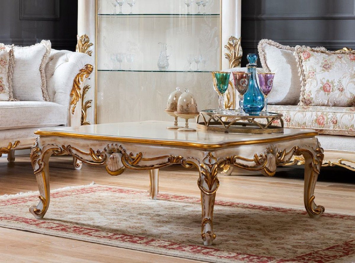 Casa Padrino Couchtisch Luxus Barock Couchtisch Beige / Weiß / Gold - Handgefertigter Massivholz Wohnzimmertisch - Barock Möbel