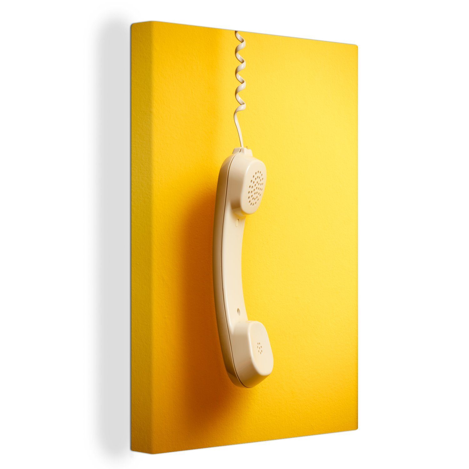 OneMillionCanvasses® Leinwandbild Der Hörer eines Retro-Telefons vor einem gelben Hintergrund, (1 St), Leinwandbild fertig bespannt inkl. Zackenaufhänger, Gemälde, 20x30 cm
