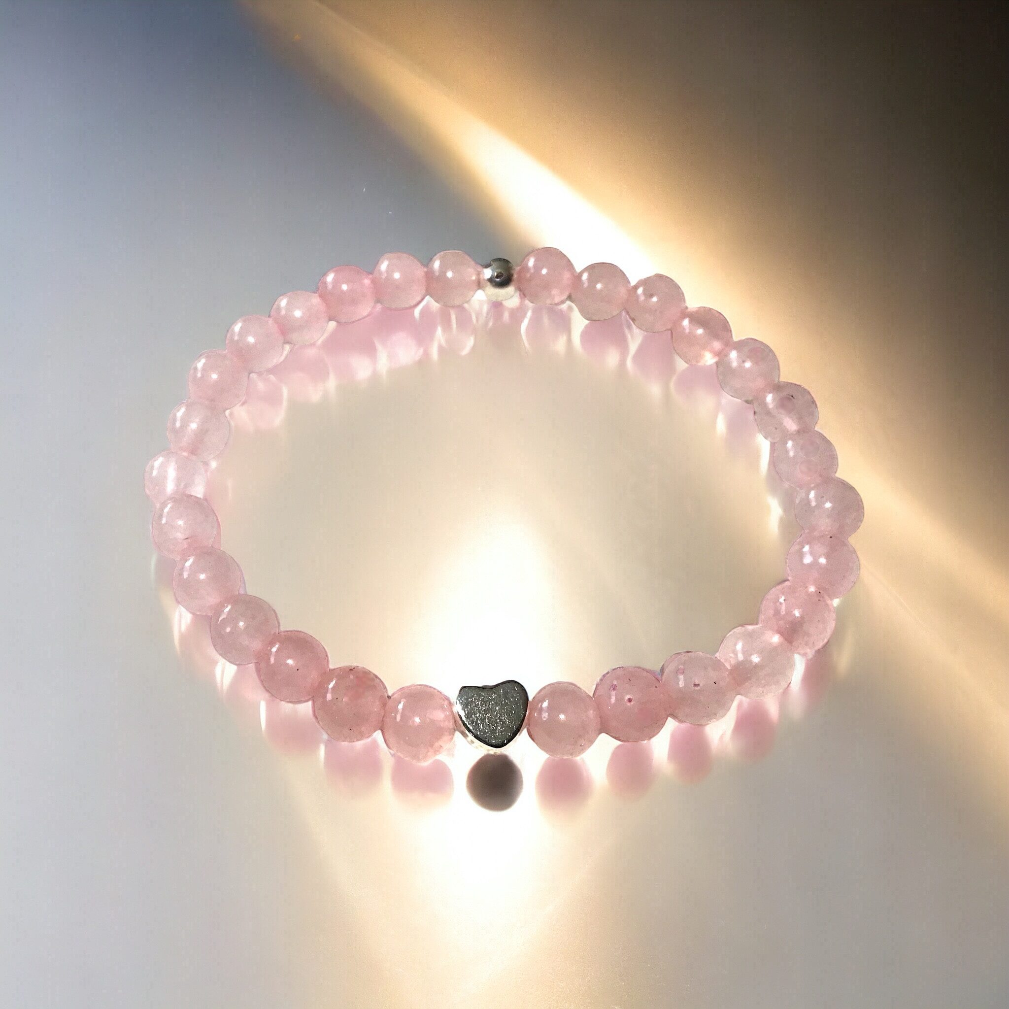Steinfixx® Perlenarmband Echtes Rosenquarz Perlenarmband mit 925 Silberperle (aus Liebe zur Natur, mit versilbertem Herzchen), Handarbeit aus Bayern