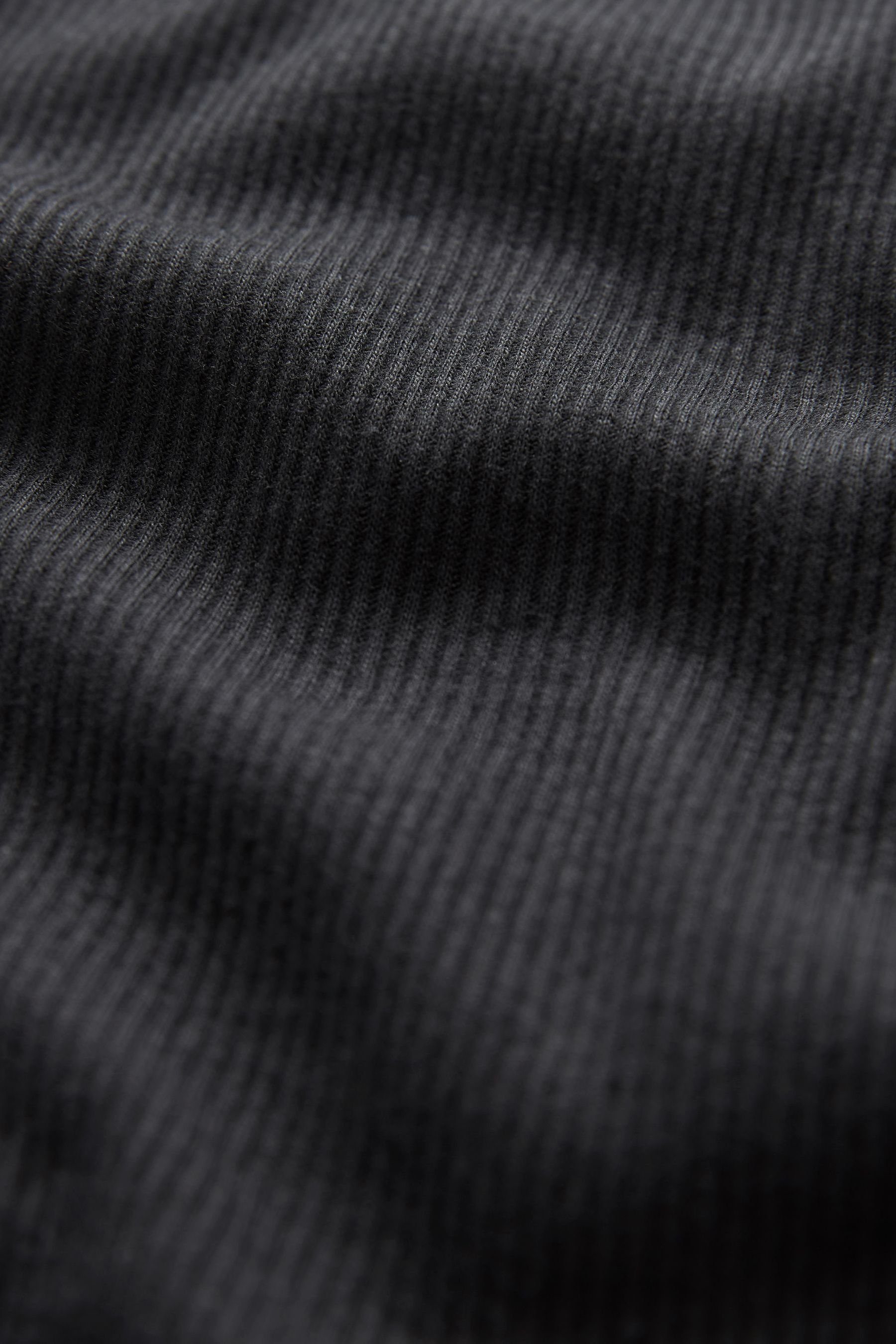 Langarmoberteil geripptes Langarmshirt (1-tlg) Asymmetrischer Black Next