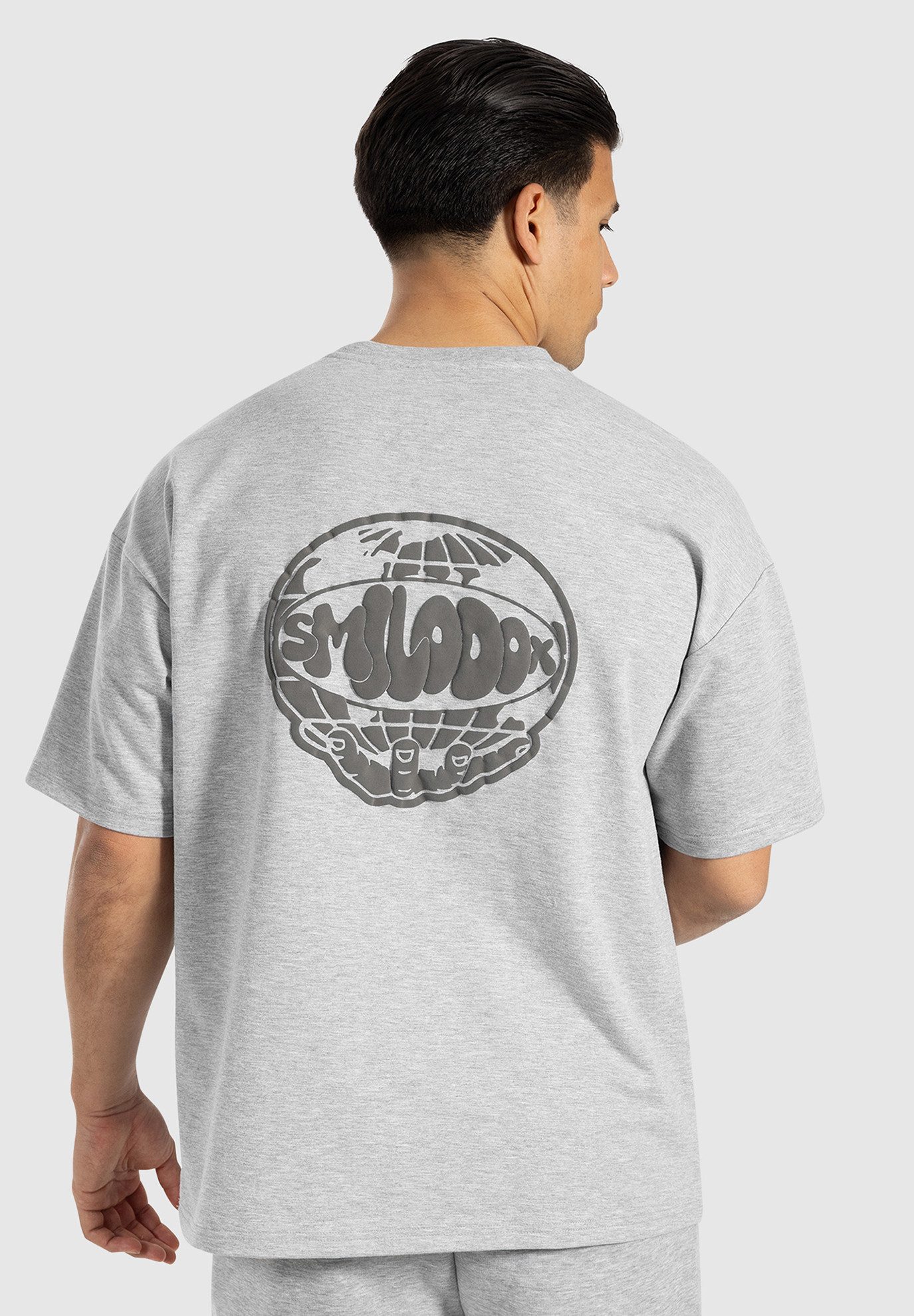 Smilodox T-Shirt Vlery, Oversized Kurzarm Shirt, Globus-Rückenprint & Locke günstig online kaufen