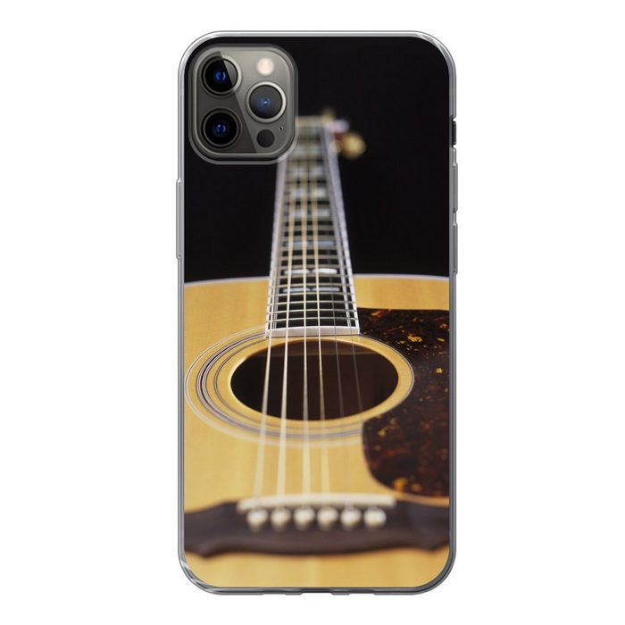 MuchoWow Handyhülle Eine liegende akustische Gitarre Handyhülle Apple iPhone 13 Pro Max Smartphone-Bumper Print Handy