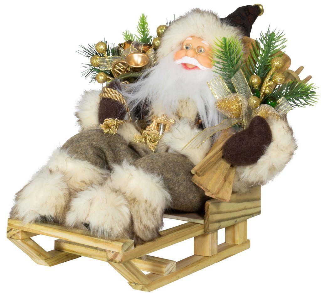 Christmas paradise Weihnachtsmann "Dennis" auf Schlitten 30cm (1 St