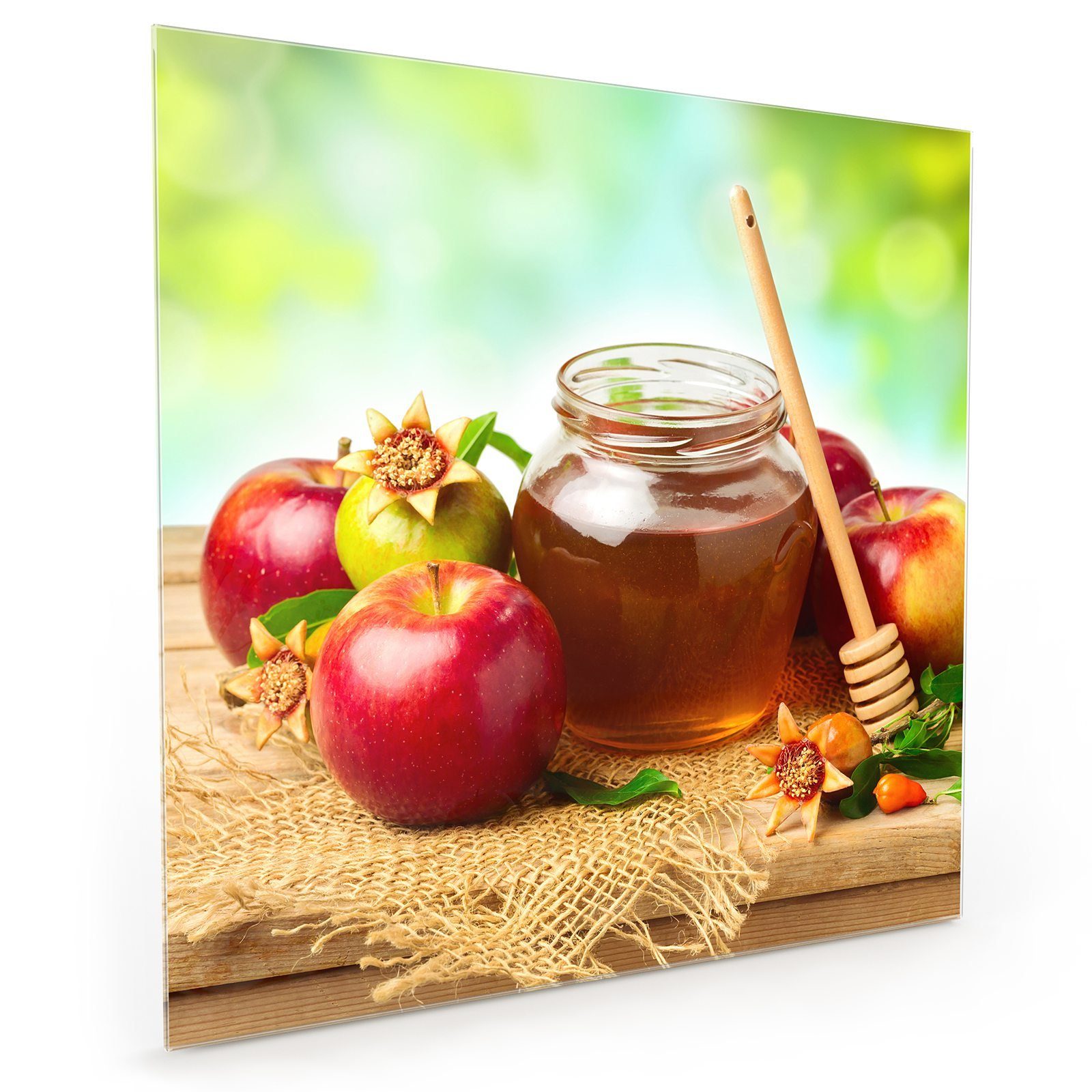 Primedeco Küchenrückwand Spritzschutz Glas Honig und Apfel im Grünen