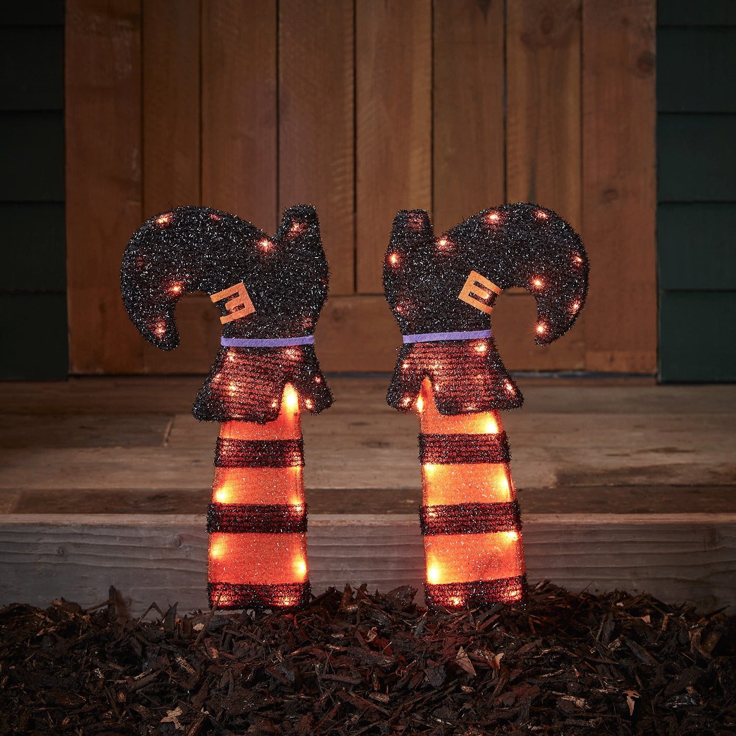 Lights4fun LED Dekofigur Halloweendeko außen Hexenbeine mit Erdspießen Batteriebetrieb