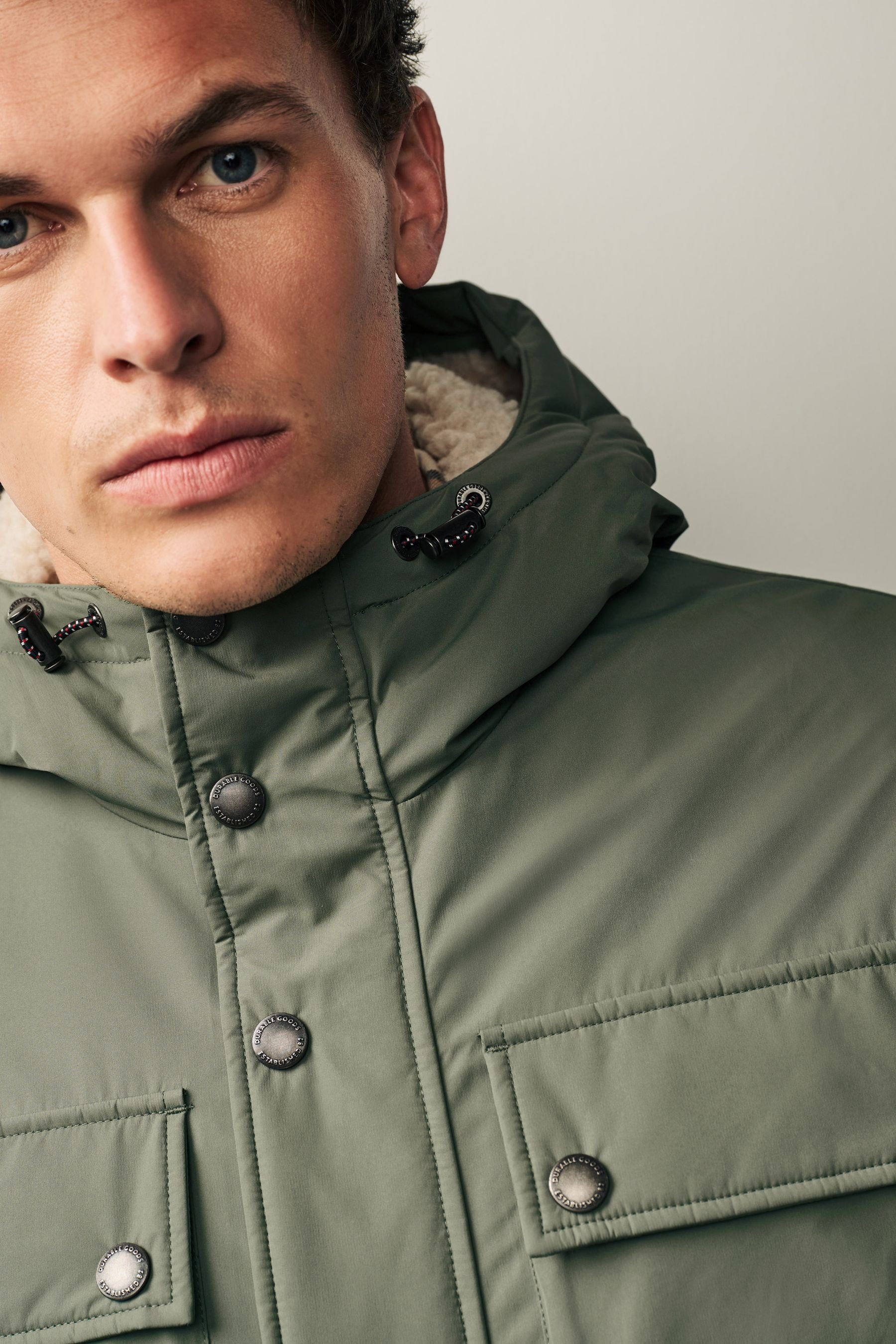 mit Sage Jacke Tasche Green (1-St) Winterjacke Plüschfutter Next 4 und