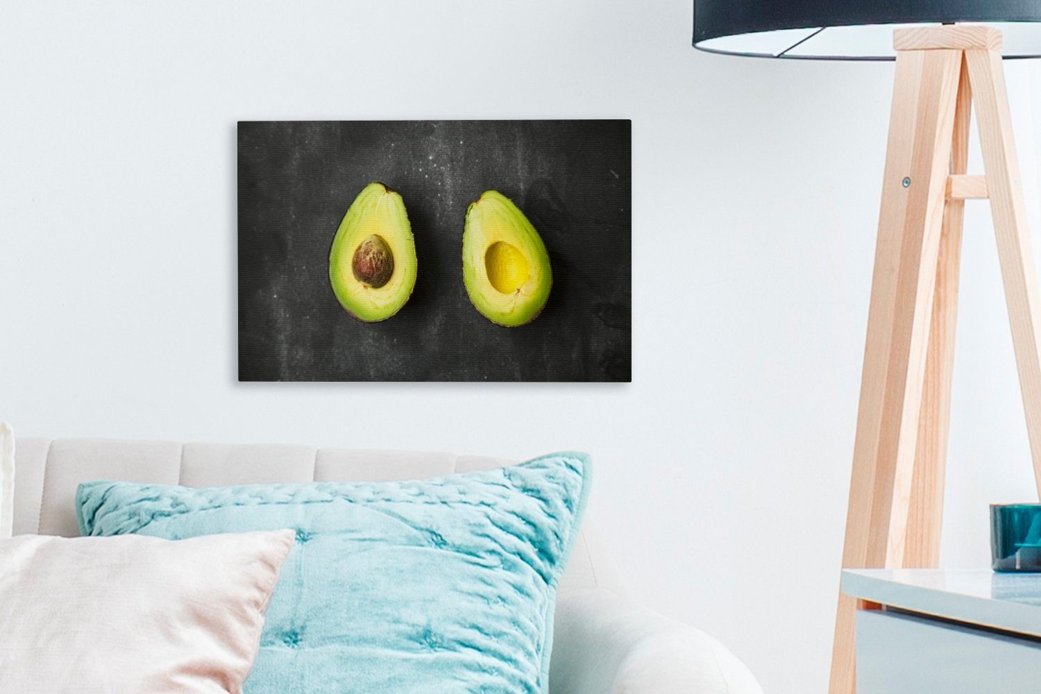 Wanddeko, Wandbild (1 Leinwandbilder, cm Tisch, OneMillionCanvasses® Avocadohälften auf Aufhängefertig, Leinwandbild St), einem 30x20