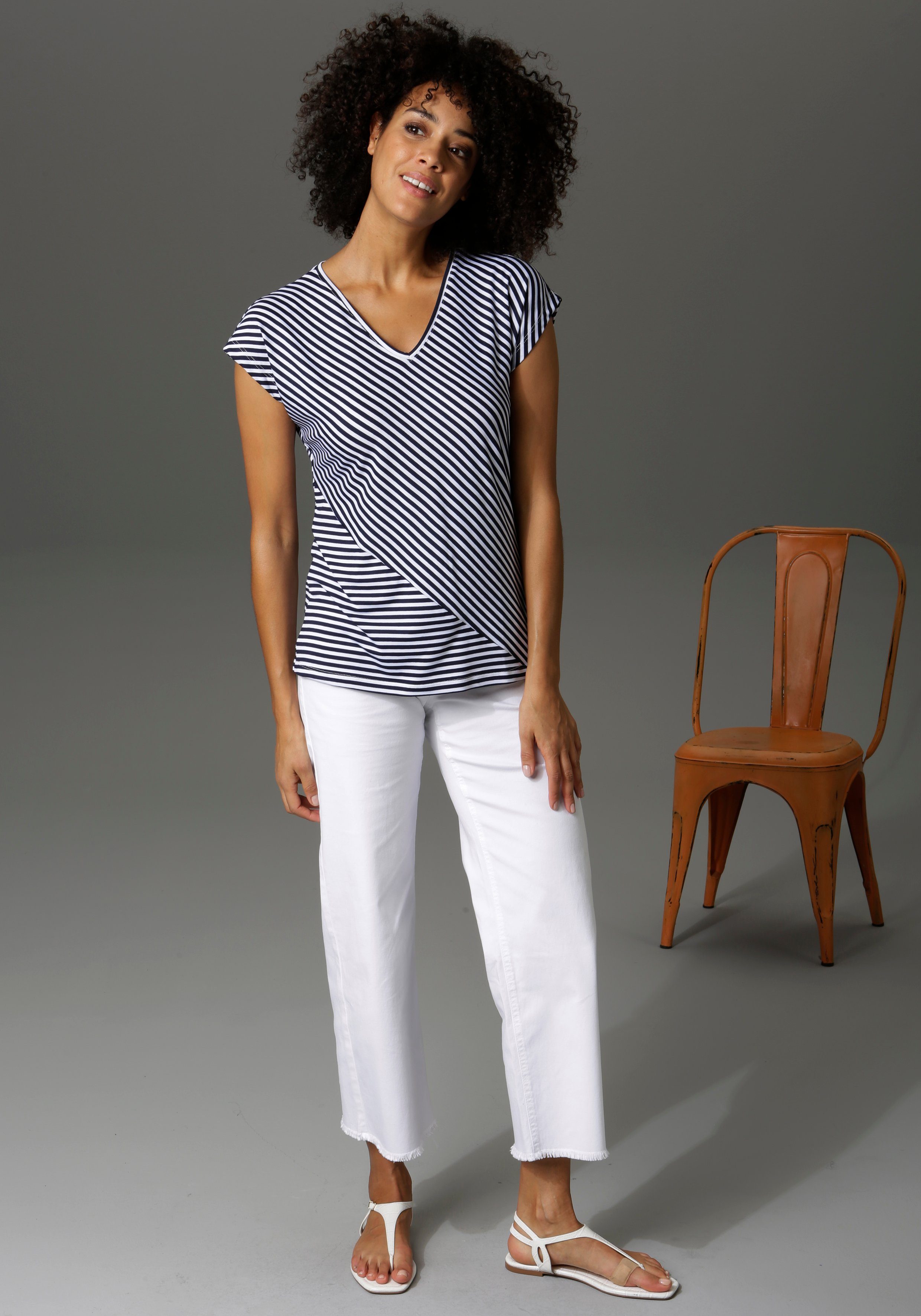 Aniston CASUAL 7/8-Jeans mit leicht ausgefranstem Beinabschluss – Bild 5 von 5