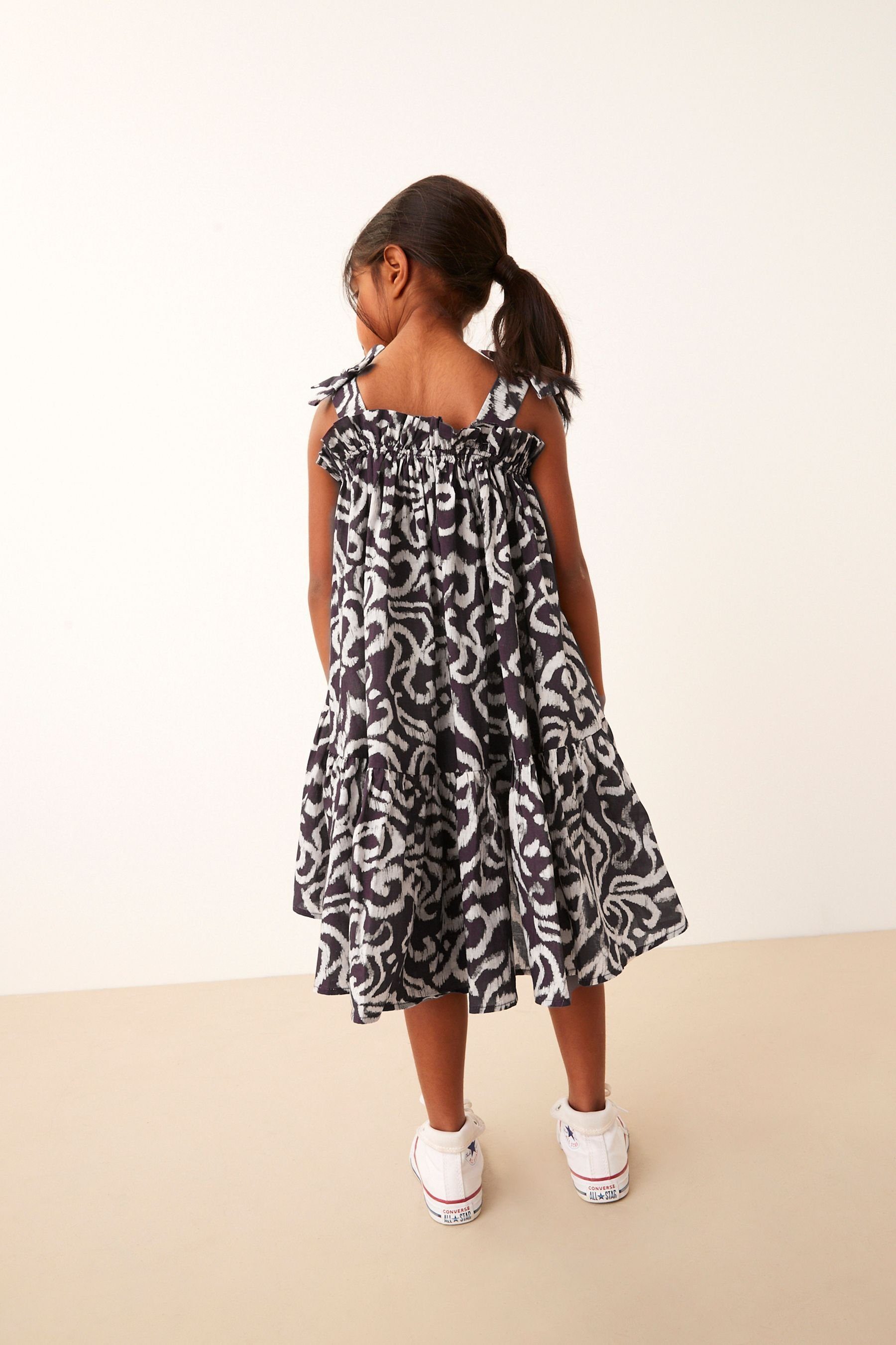 (1-tlg) Swirl Kleid gebundenen Trägern Sommerkleid Next Black Print mit