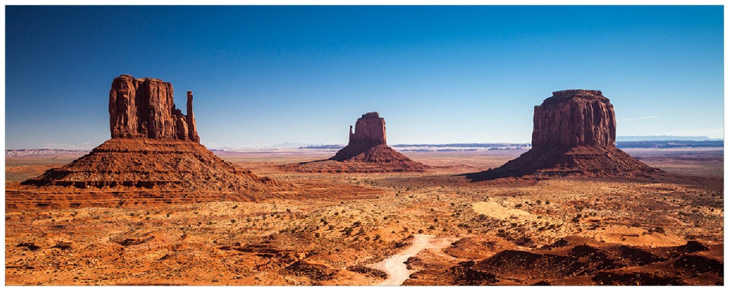 Wallario Memoboard Monument Valley unter blauem Himmel