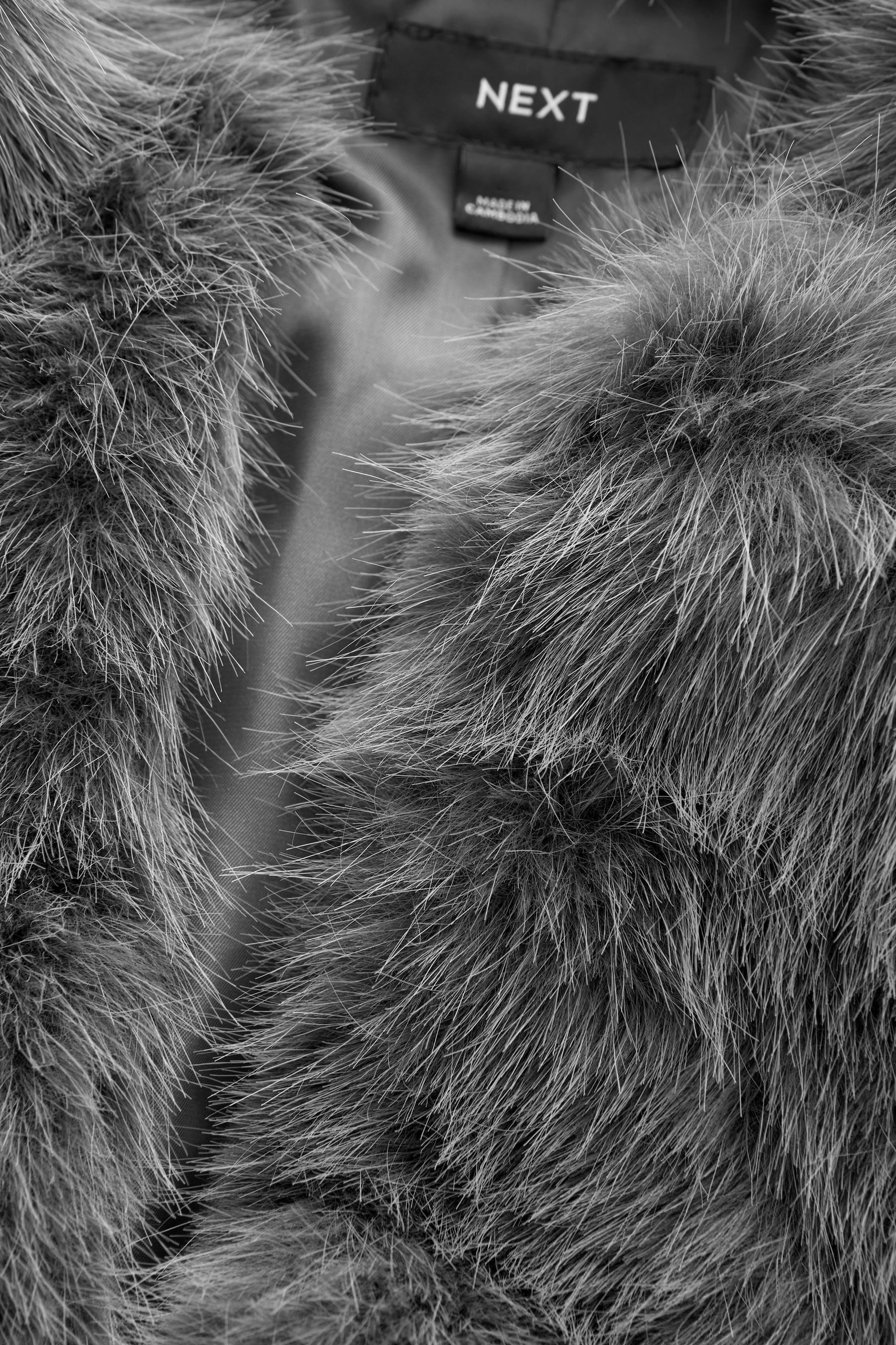 Next Fellimitatjacke Kragenloser Kunstfellmantel, Kurzgröße (1-St) günstig online kaufen