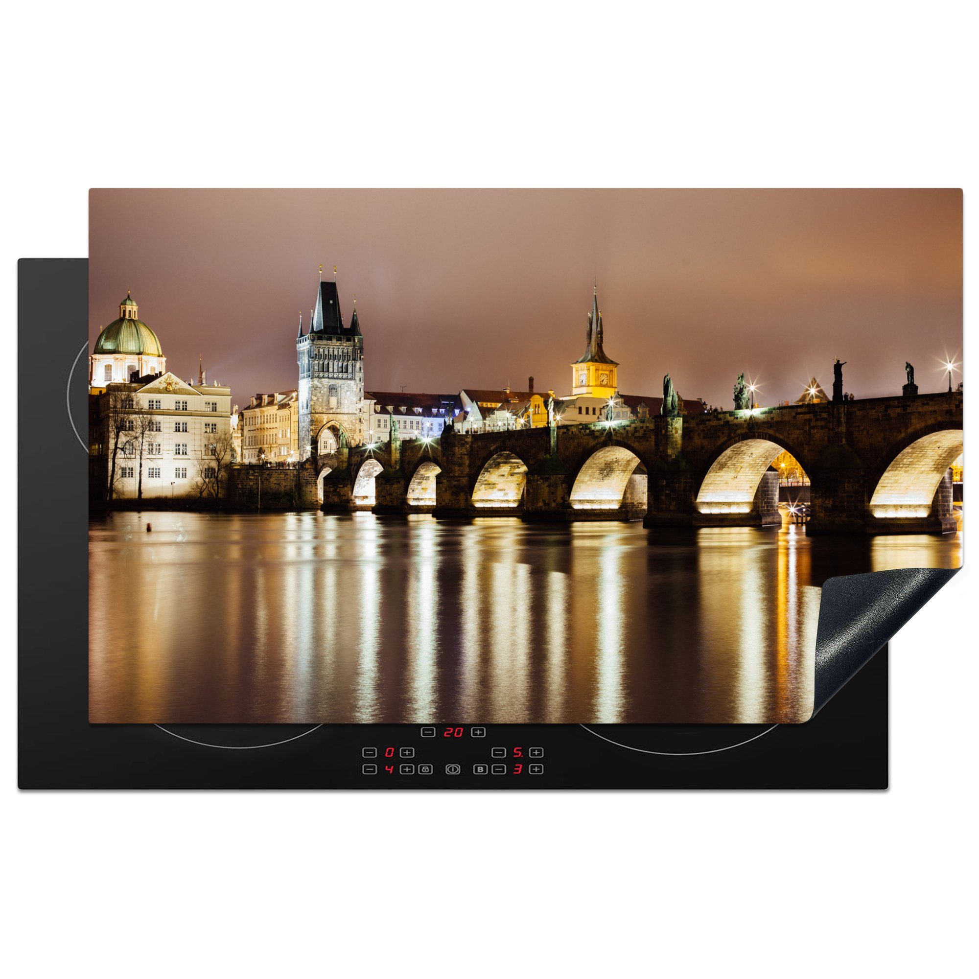 MuchoWow Herdblende-/Abdeckplatte Eine gelb beleuchtete Karlsbrücke in Prag bei Nacht, Vinyl, (1 tlg), 83x51 cm, Ceranfeldabdeckung, Arbeitsplatte für küche