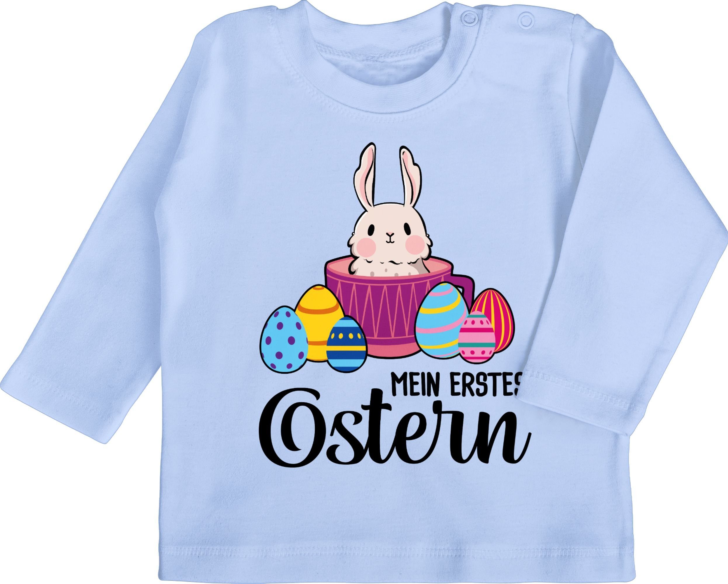 Shirtracer T-Shirt Mein erstes Ostern - Hase in Tasse - schwarz Ostergeschenke 3 Babyblau