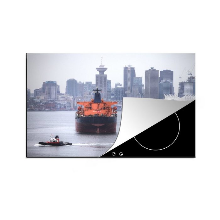 MuchoWow Herdblende-/Abdeckplatte Schlepper fährt an einem Frachtschiff vorbei Vinyl (1 tlg) Ceranfeldabdeckung für die küche Induktionsmatte
