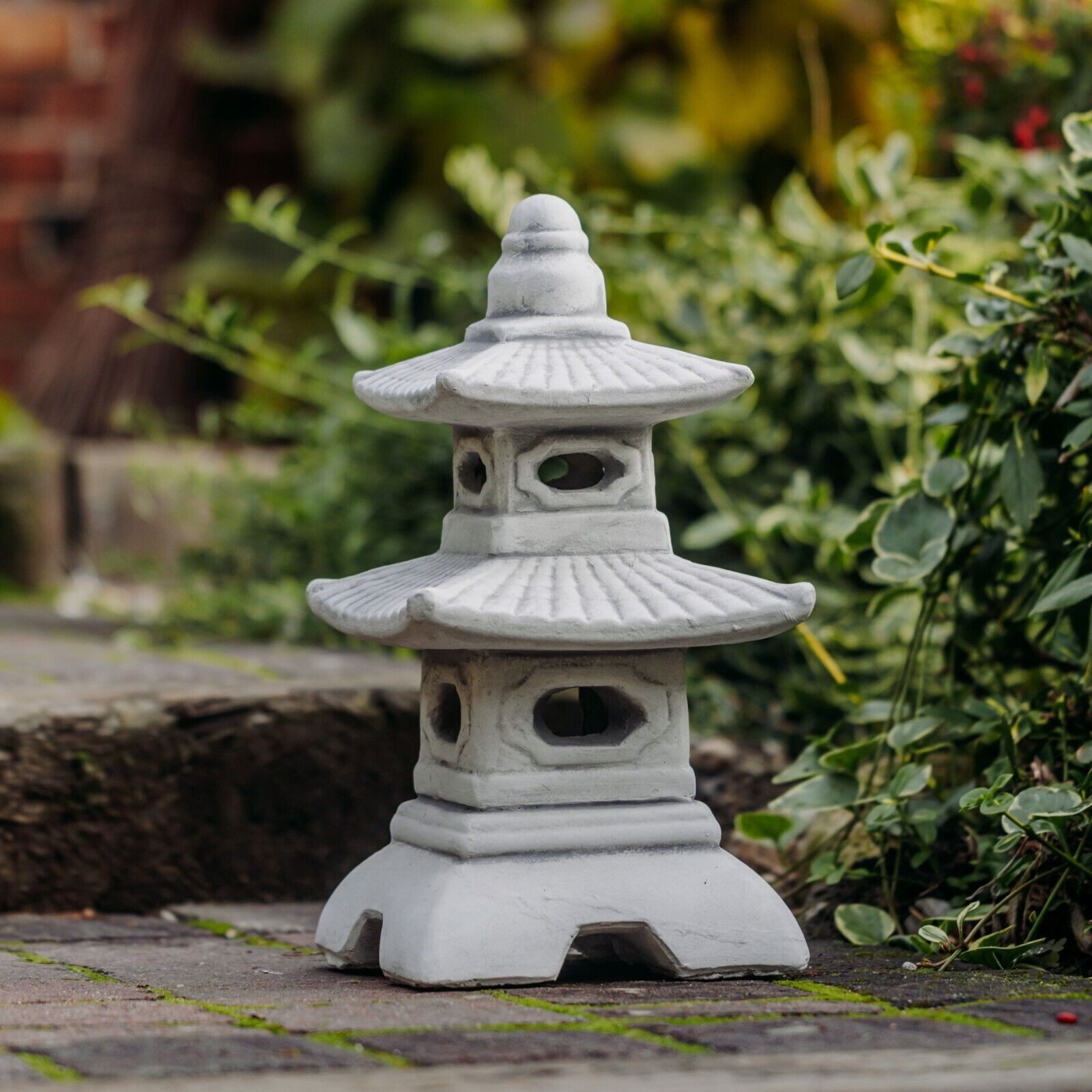 gartendekoparadies.de Gartenfigur Japanische Pagode mit acht günstig online kaufen