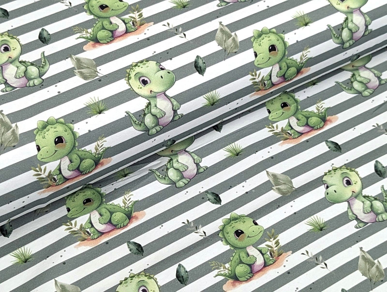 Corileo Stoff EP Bio Baumwolljersey Kleiner Dino auf Grün Stoff Streifen Meterware