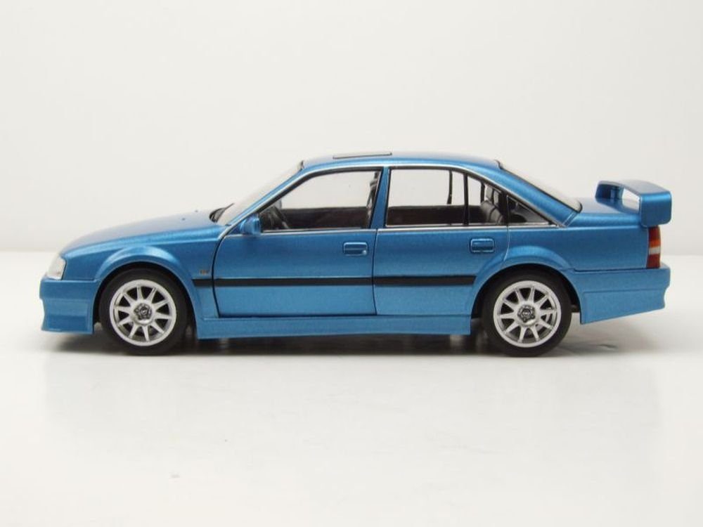 Whitebox Modellauto Opel Omega Evolution 500 1991 blau metallic, Maßstab 1:24