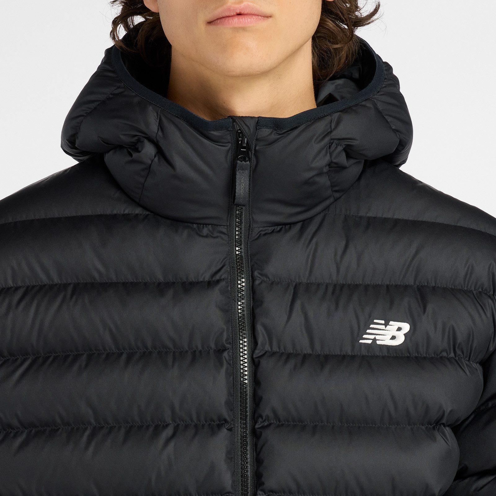 New Balance Steppjacke Hooded Puffer Jacket BLACK Warm gefütterte Übergangsjacke und Winterjacke