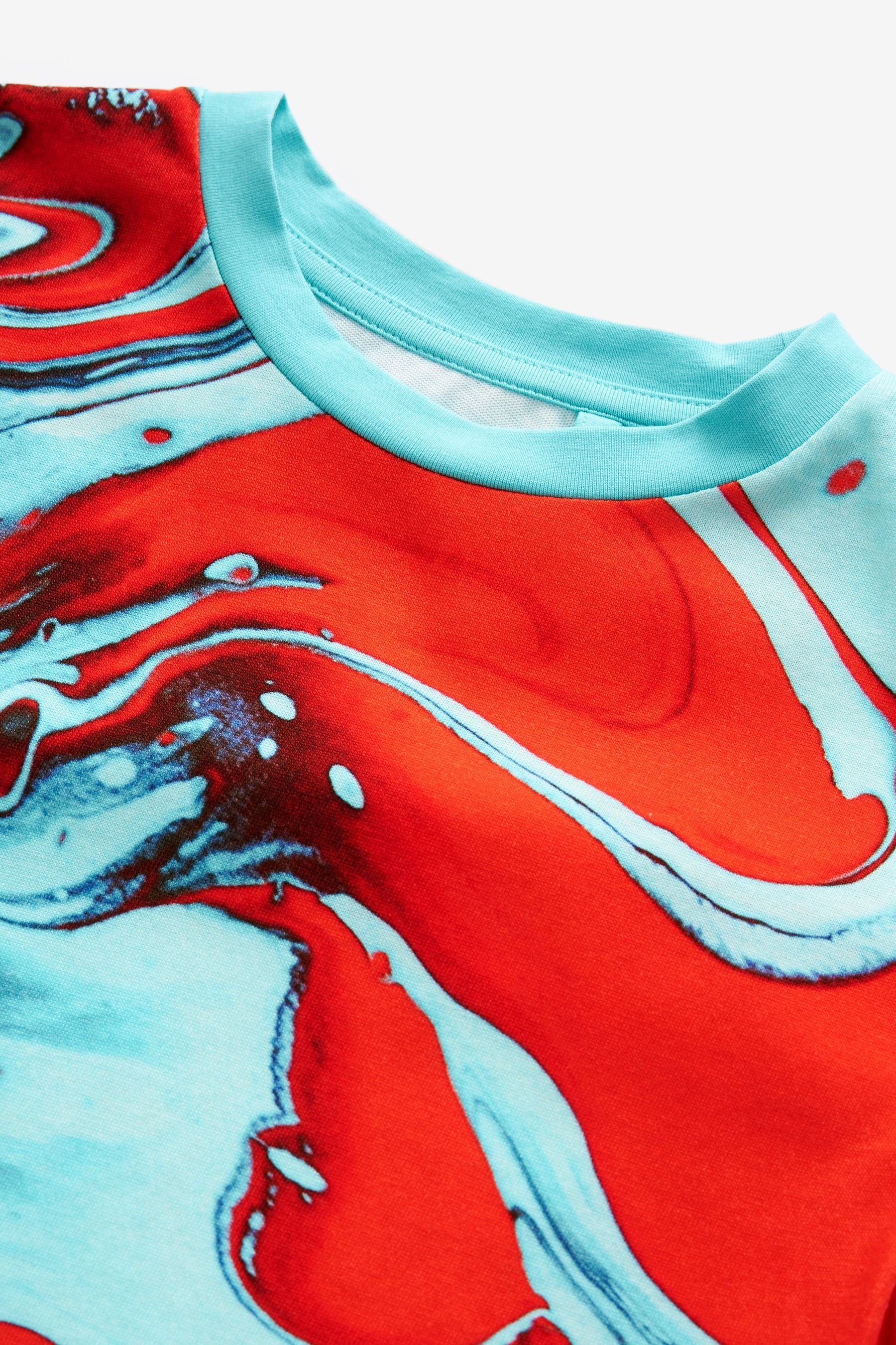 mit T-Shirt durchgehendem (1-tlg) Kurzärmeliges Red/Blue Print Next Lava T-Shirt