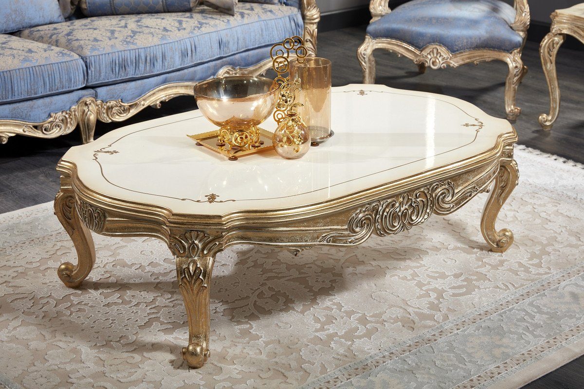 Casa Padrino Couchtisch Luxus Barock Couchtisch Weiß / Antik Gold 143 x 94 x H. 44 cm - Prunkvoller Barock Wohnzimmertisch