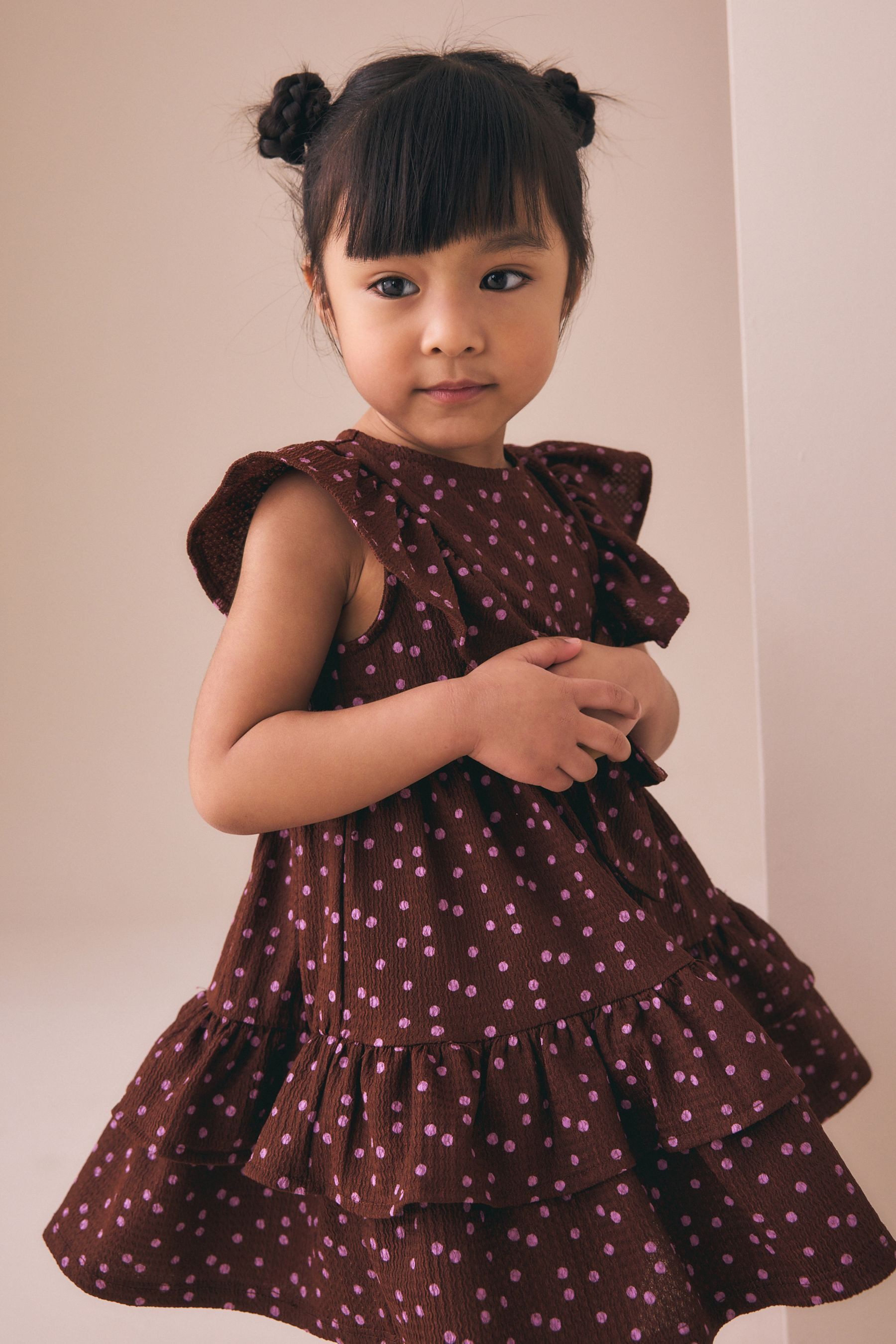 Next Jerseykleid Ärmelloses Sommerkleid mit Rüschen und Schleife (1-tlg)