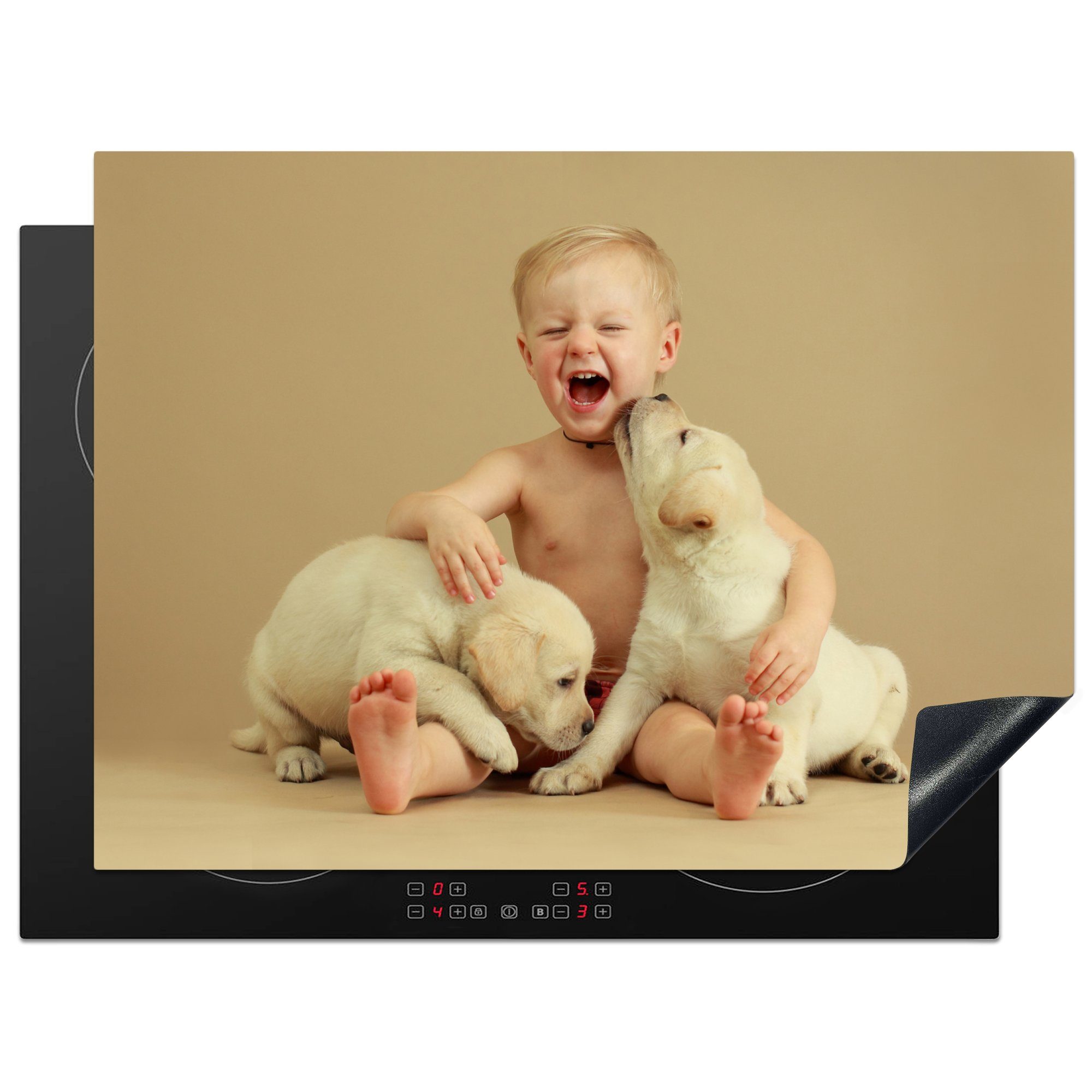 MuchoWow Herdblende-/Abdeckplatte Ein Kind mit zwei Labradorwelpen auf dem Schoß, Vinyl, (1 tlg), 70x52 cm, Mobile Arbeitsfläche nutzbar, Ceranfeldabdeckung