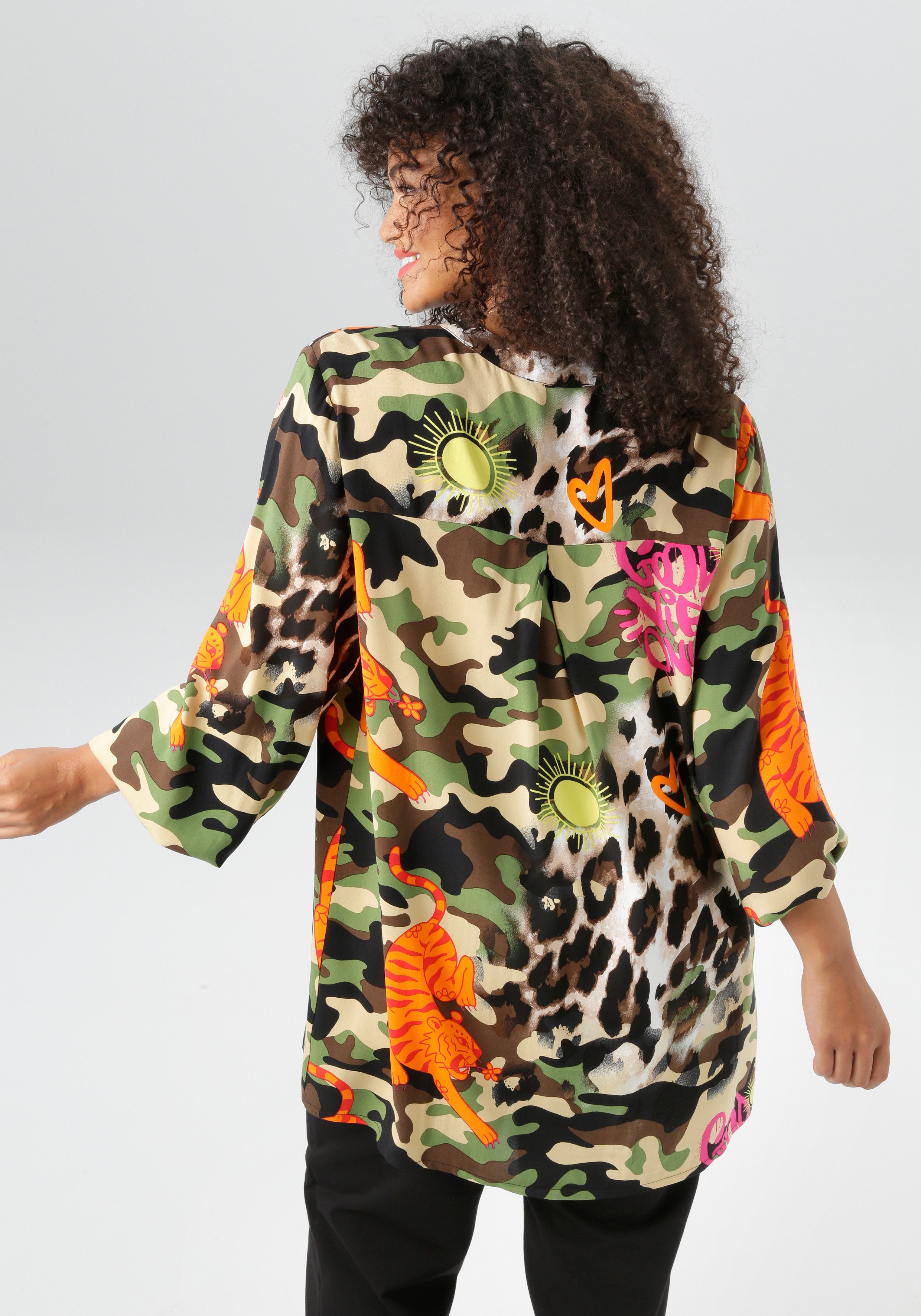 Aniston PLUS Schluppenbluse mit extravaganten farbenfrohes Animaldessin günstig online kaufen
