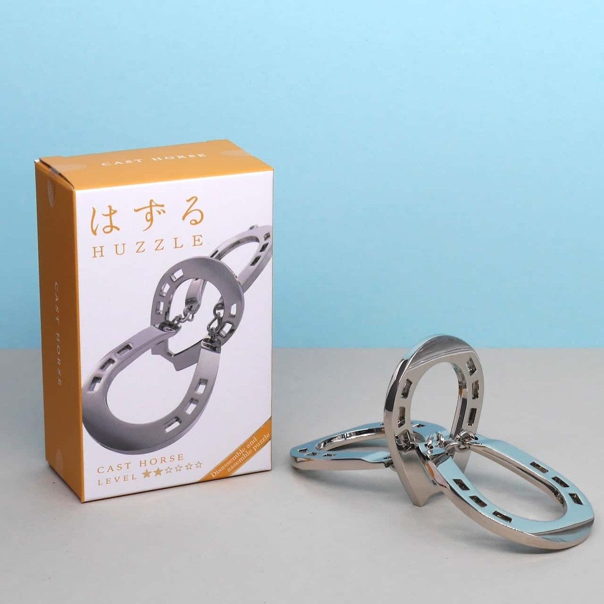 Hanayama Spiel HUZZLE CAST HORSE - einfaches Geduldsspiel, Denkspiel, Metallpuzzle