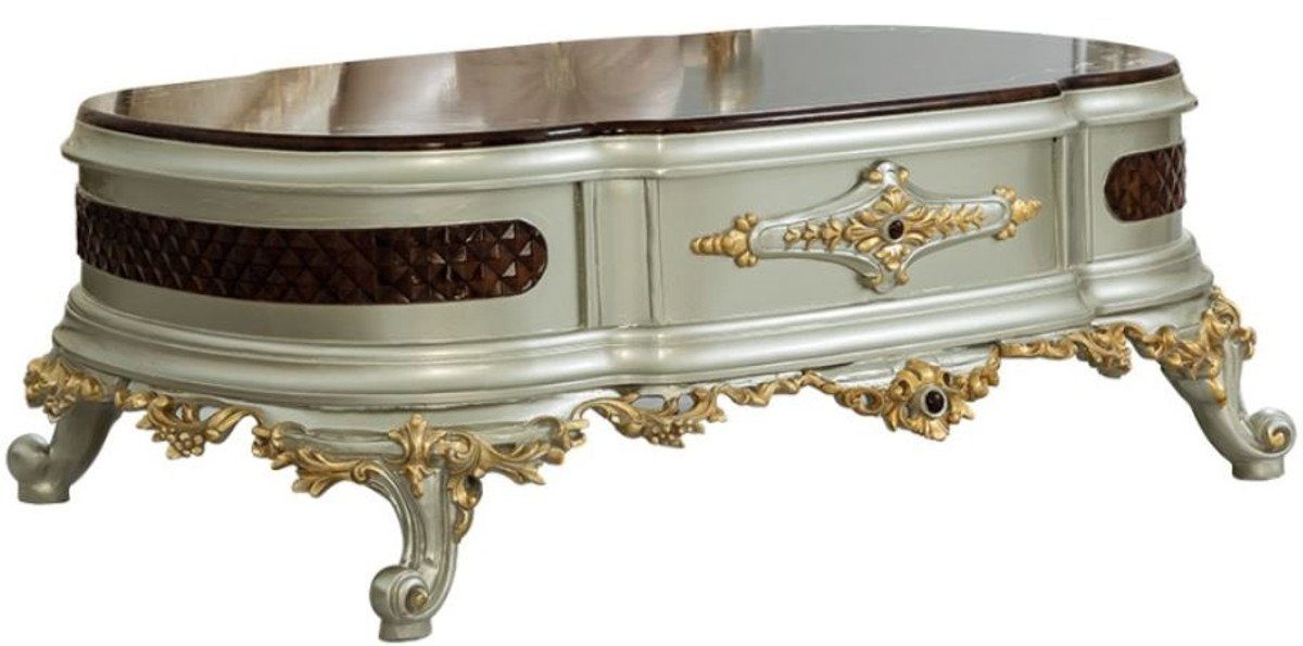 Casa Padrino Couchtisch Luxus Barock Couchtisch Dunkelbraun / Silber / Gold 132 x 95 x H. 50 cm - Prunkvoller Massivholz Wohnzimmertisch - Barock Möbel