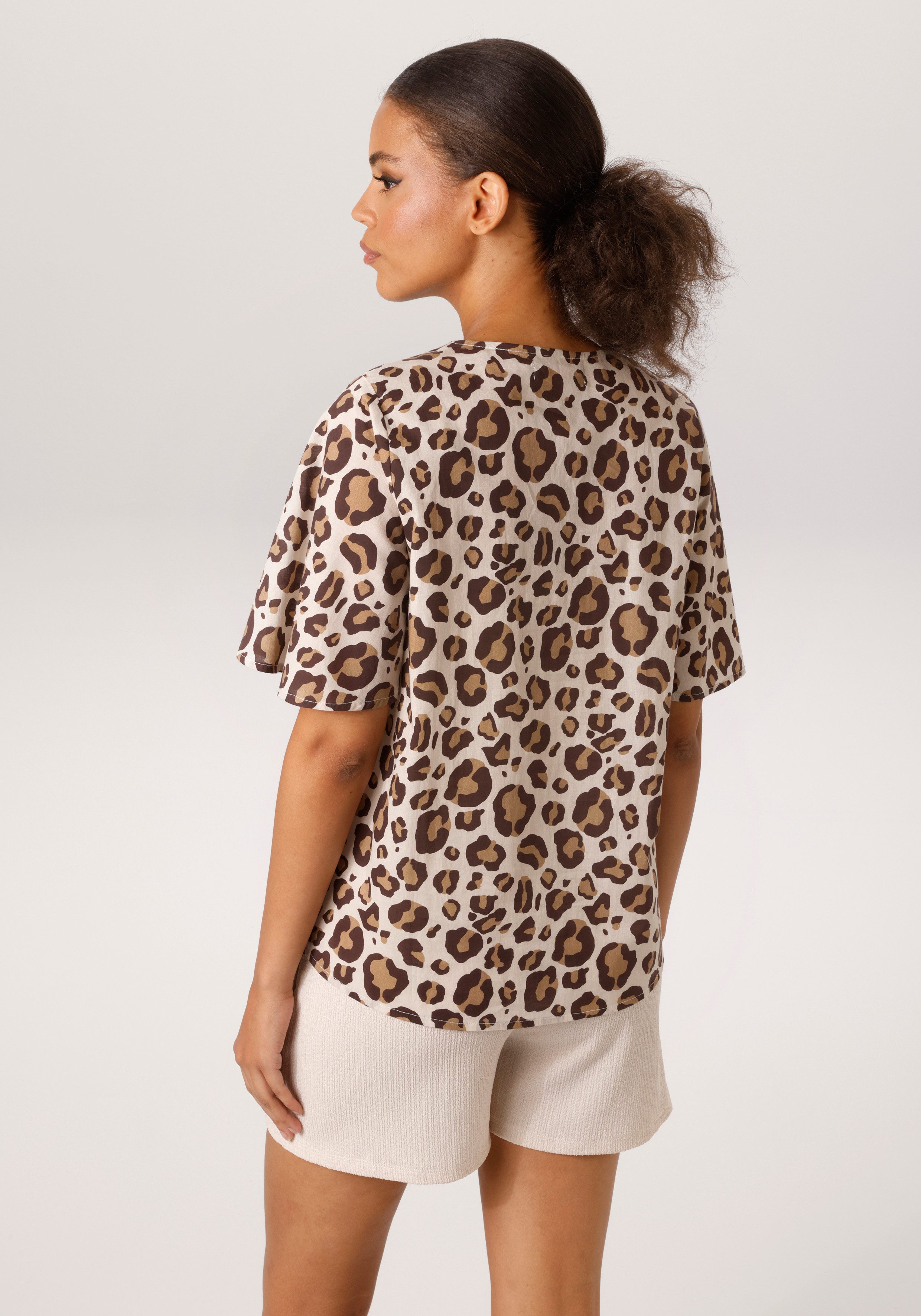 Aniston CASUAL Schlupfbluse im farbharmonischen Leoprint - jedes Teil ein U günstig online kaufen
