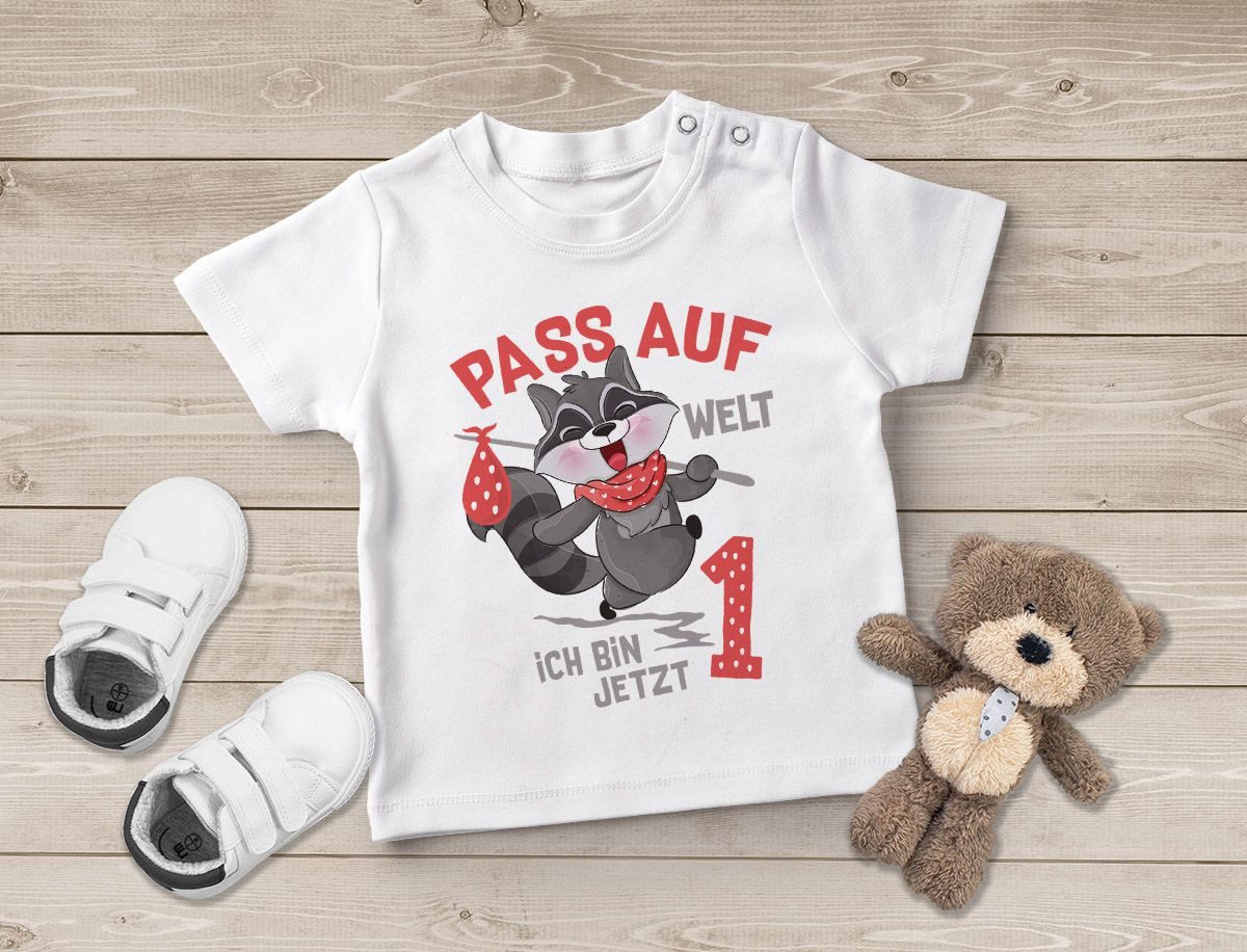 MoonWorks Print-Shirt Baby T-Shirt 1. Geburtstag Pass auf Welt ich bin jetzt 1 Waschbär