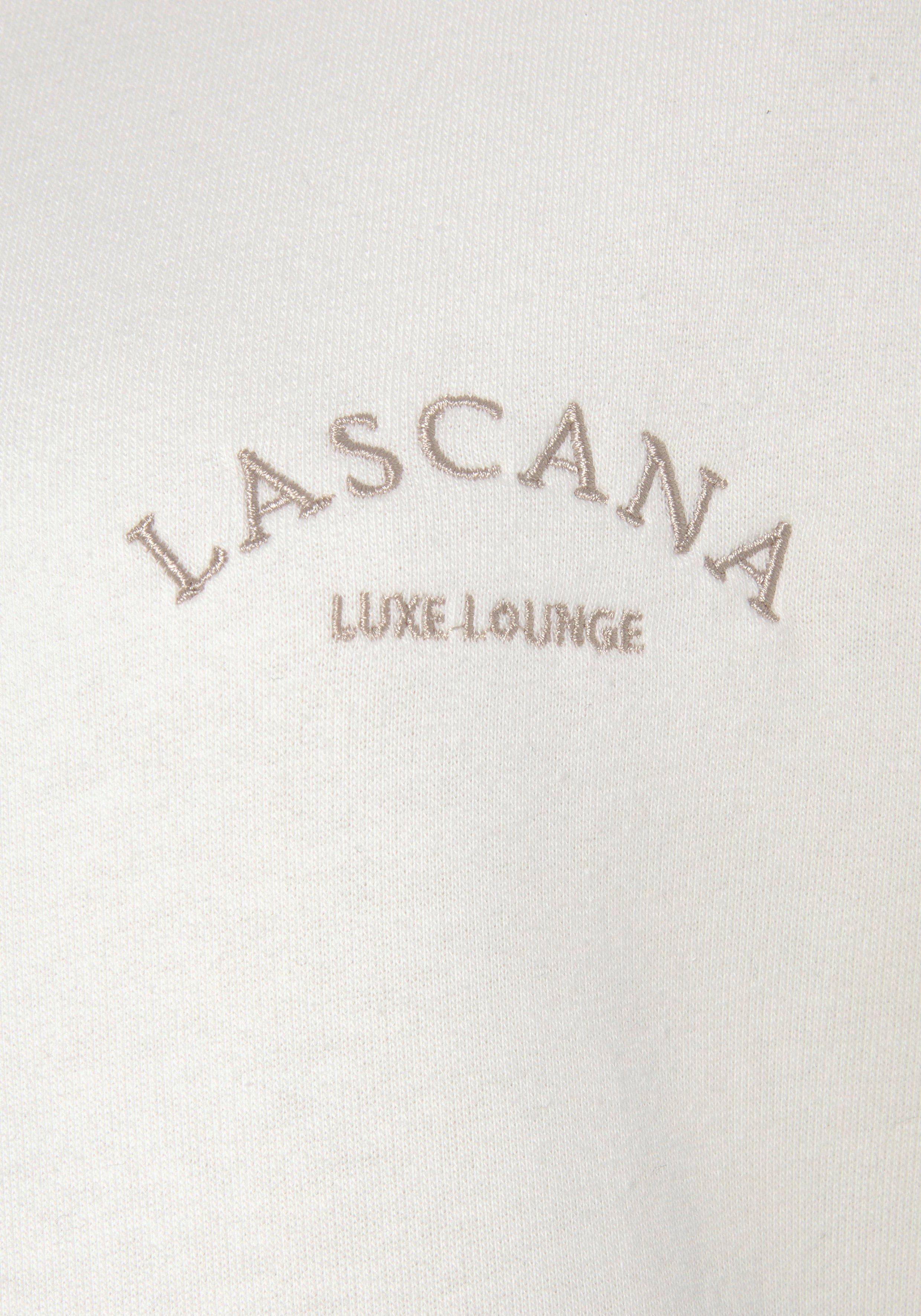 Innen seitlichen -Sweatjacke beige LASCANA Loungeanzug Taschen angeraut, mit Kapuze und Kapuzensweatjacke mit Loungewear,