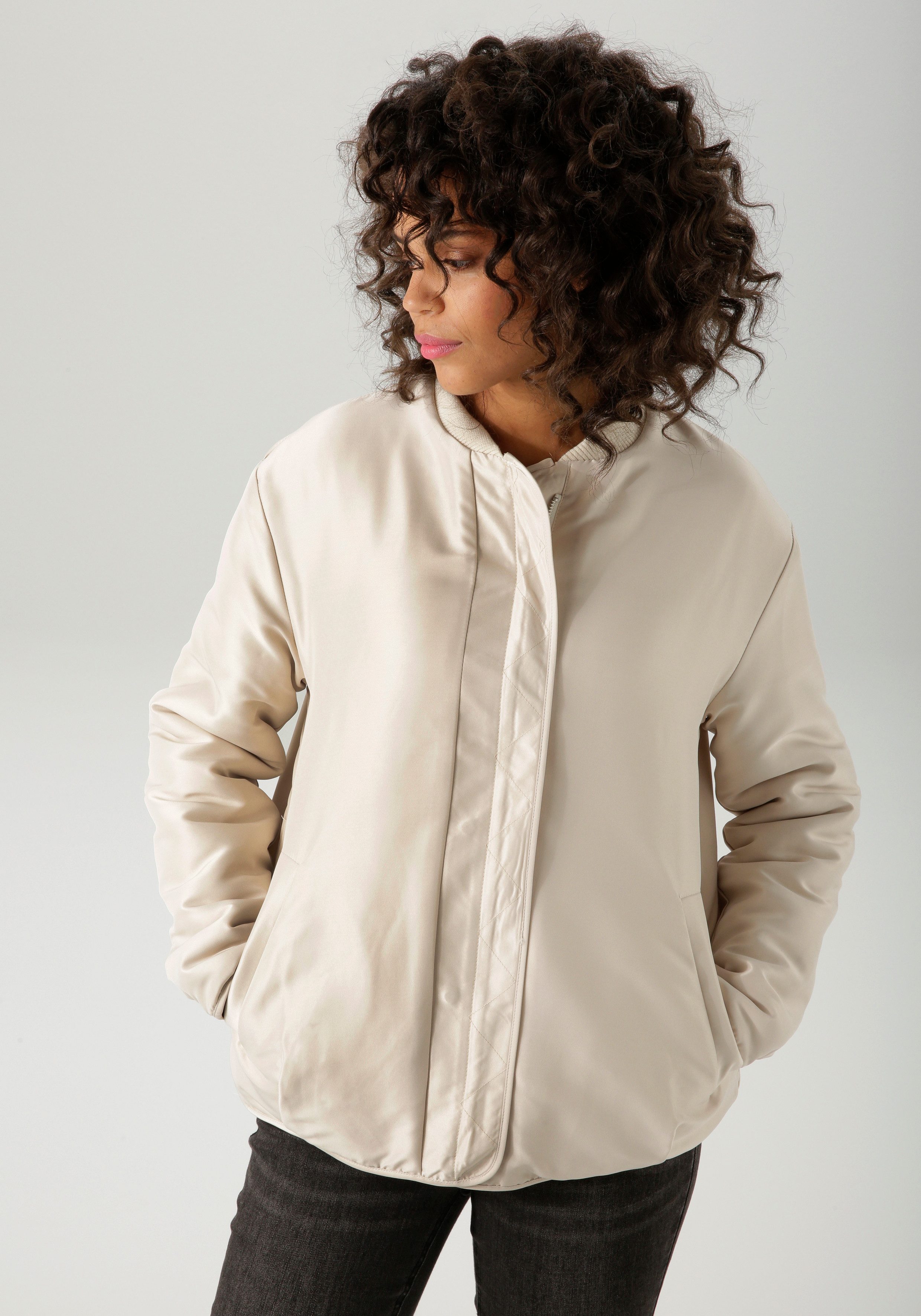 Aniston CASUAL Wendejacke aus kuscheligem Teddy-Plüsch und glattem Webstoff günstig online kaufen