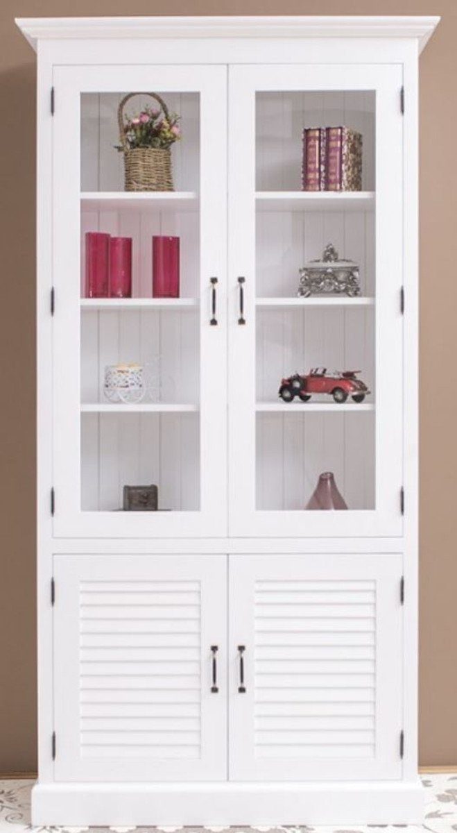 Casa Padrino Stauraumschrank Landhausstil Massivholz Schrank mit 4 Türen Weiß 64 x 39 x H. 210 cm - Regalschrank - Wohnzimmerschrank - Vitrinenschrank - Landhausstil Möbel