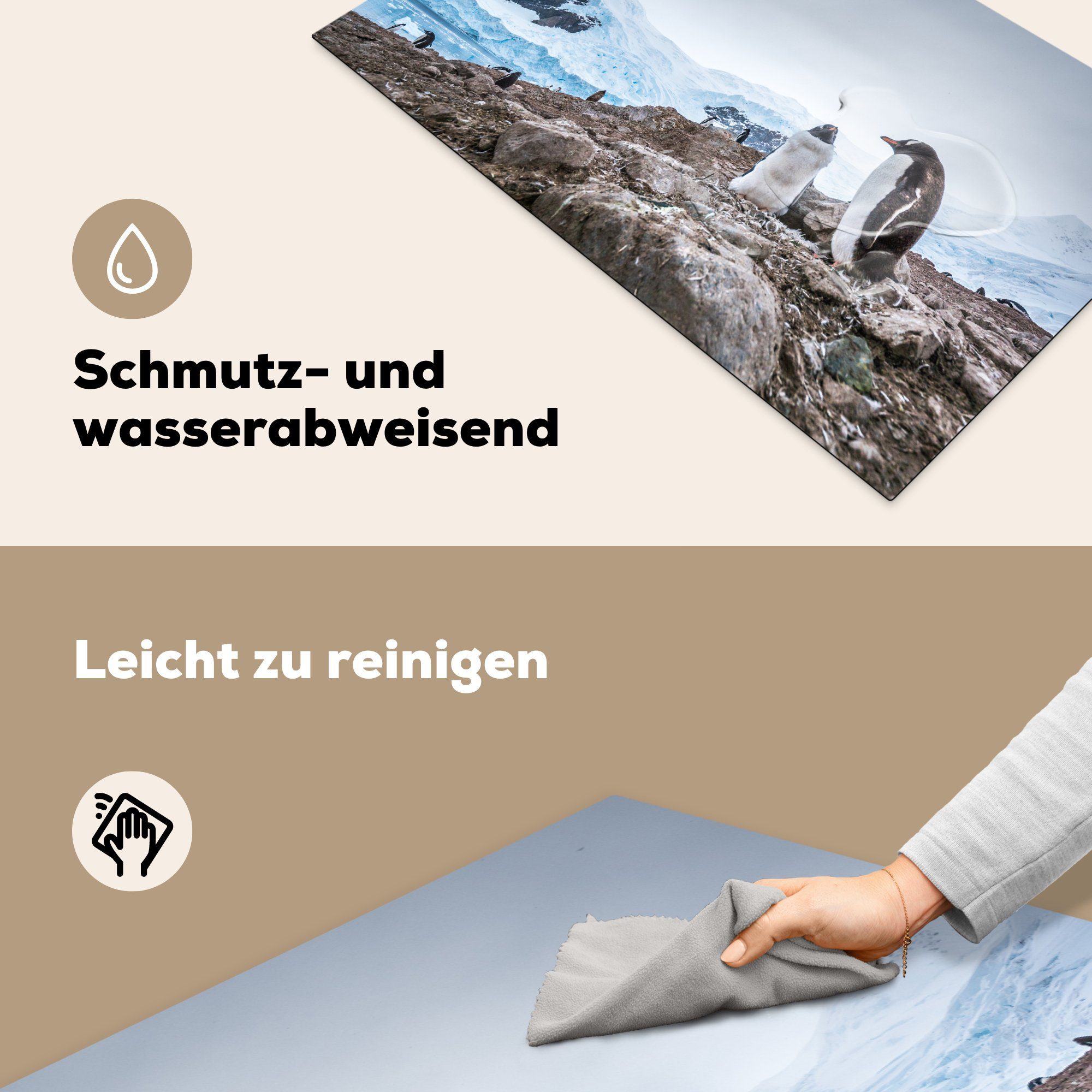 Antarktis, MuchoWow für Arbeitsplatte (1 stehen Ceranfeldabdeckung, auf einem der Vinyl, Herdblende-/Abdeckplatte cm, Pinguine in küche 83x51 tlg), Felsen