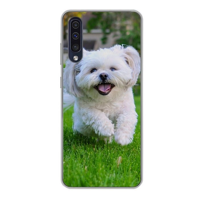 MuchoWow Handyhülle Ein Shih Tzu Hund läuft durch das grüne Gras Handyhülle Samsung Galaxy A50 Smartphone-Bumper Print Handy