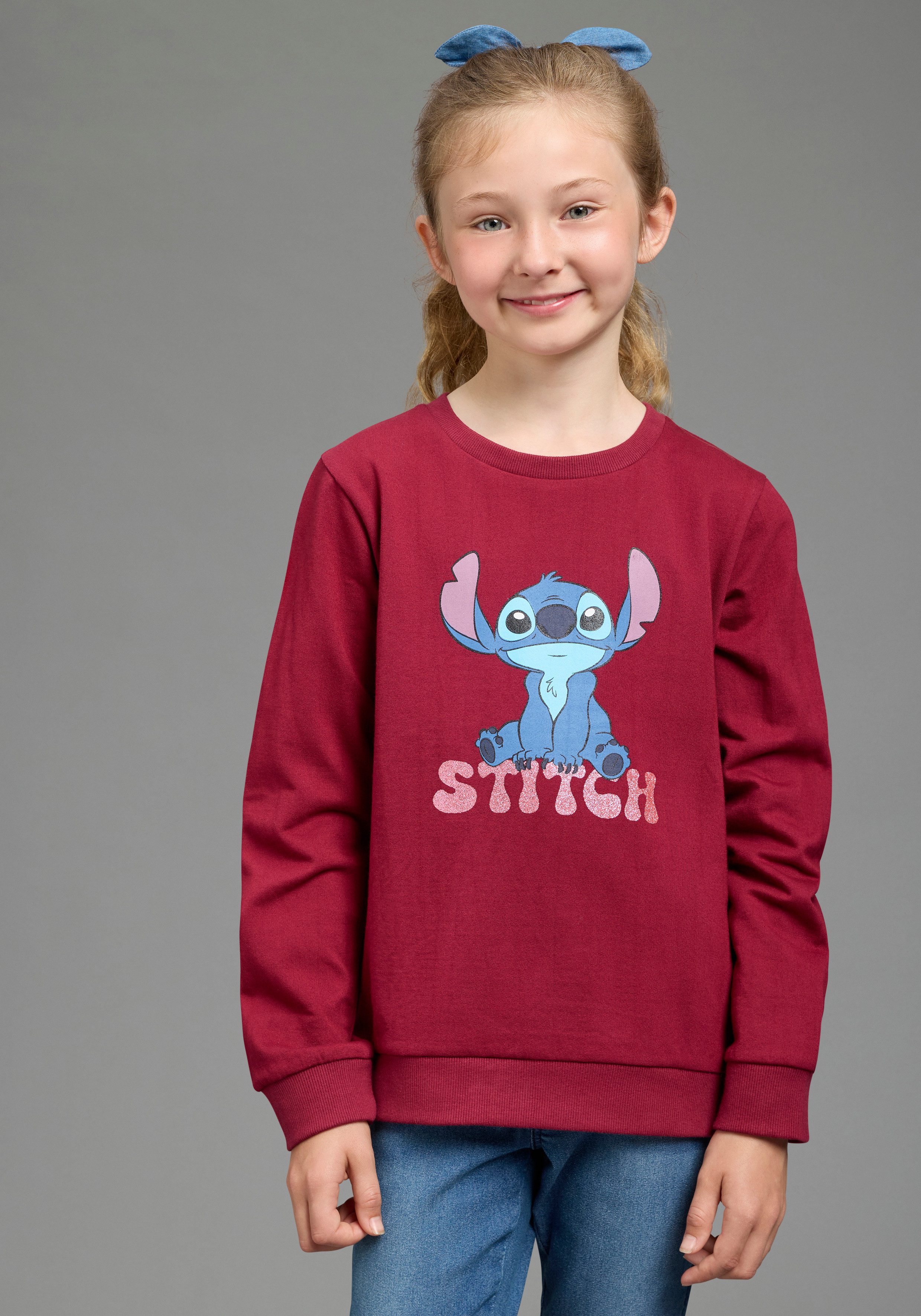 KIDSWORLD Sweatshirt STITCH Glitzerprint Sweatshirt, Disney mit Rundhalsausschnitt, mit Rippbündchen, hüftbedeckende Länge. € 24,99, (€ 24,99 pro 1 Stk).