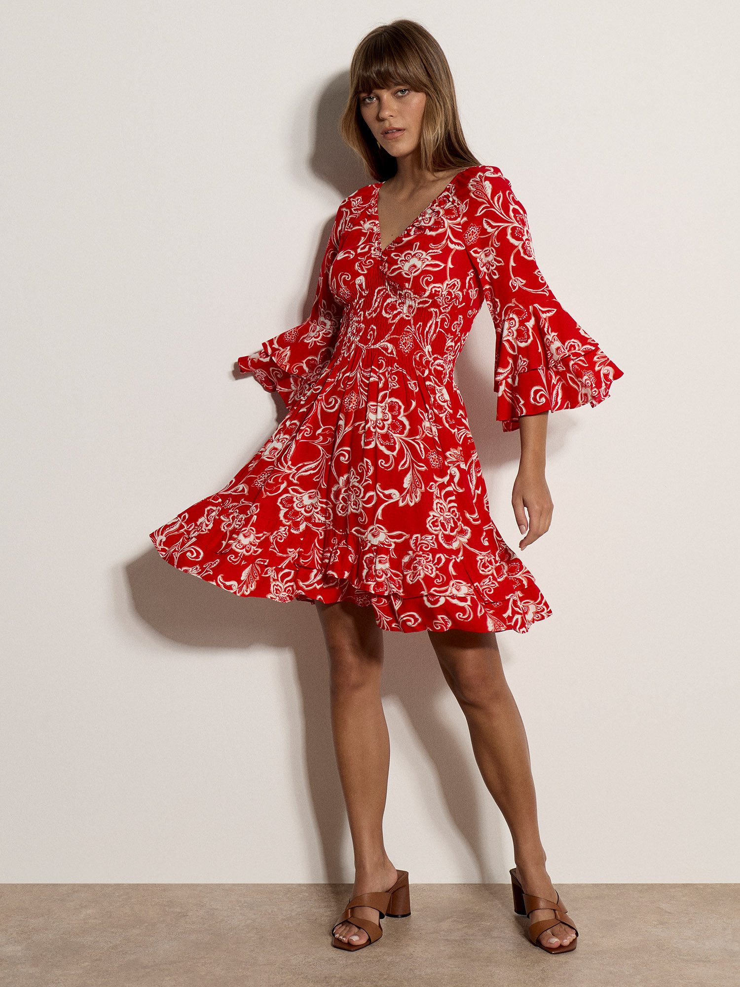 Apricot Minikleid Smok-Minikleid mit Trompetenärmeln