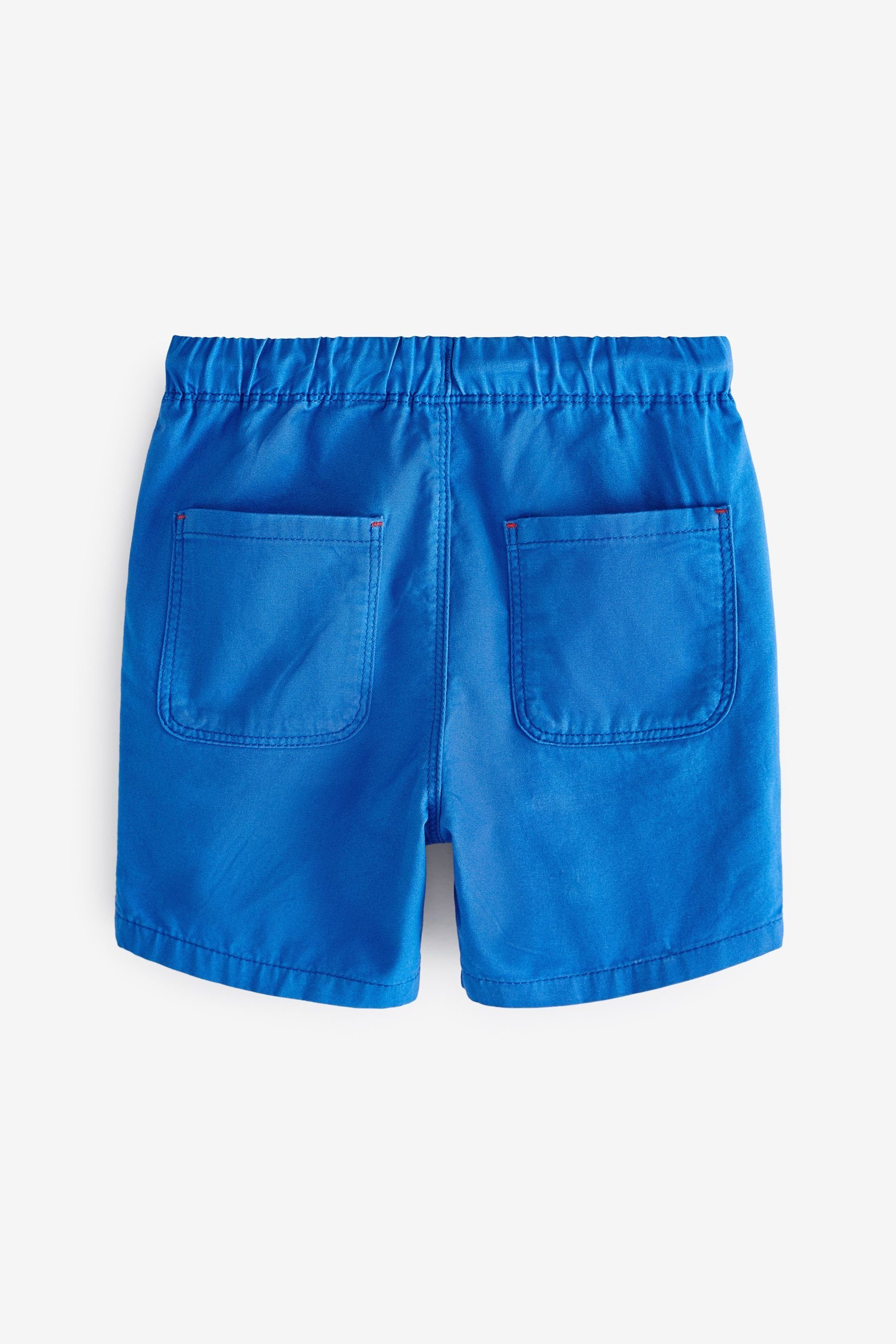Next Shorts Schlupf-Shorts gesticktem Blue mit (1-tlg) Aufnäher