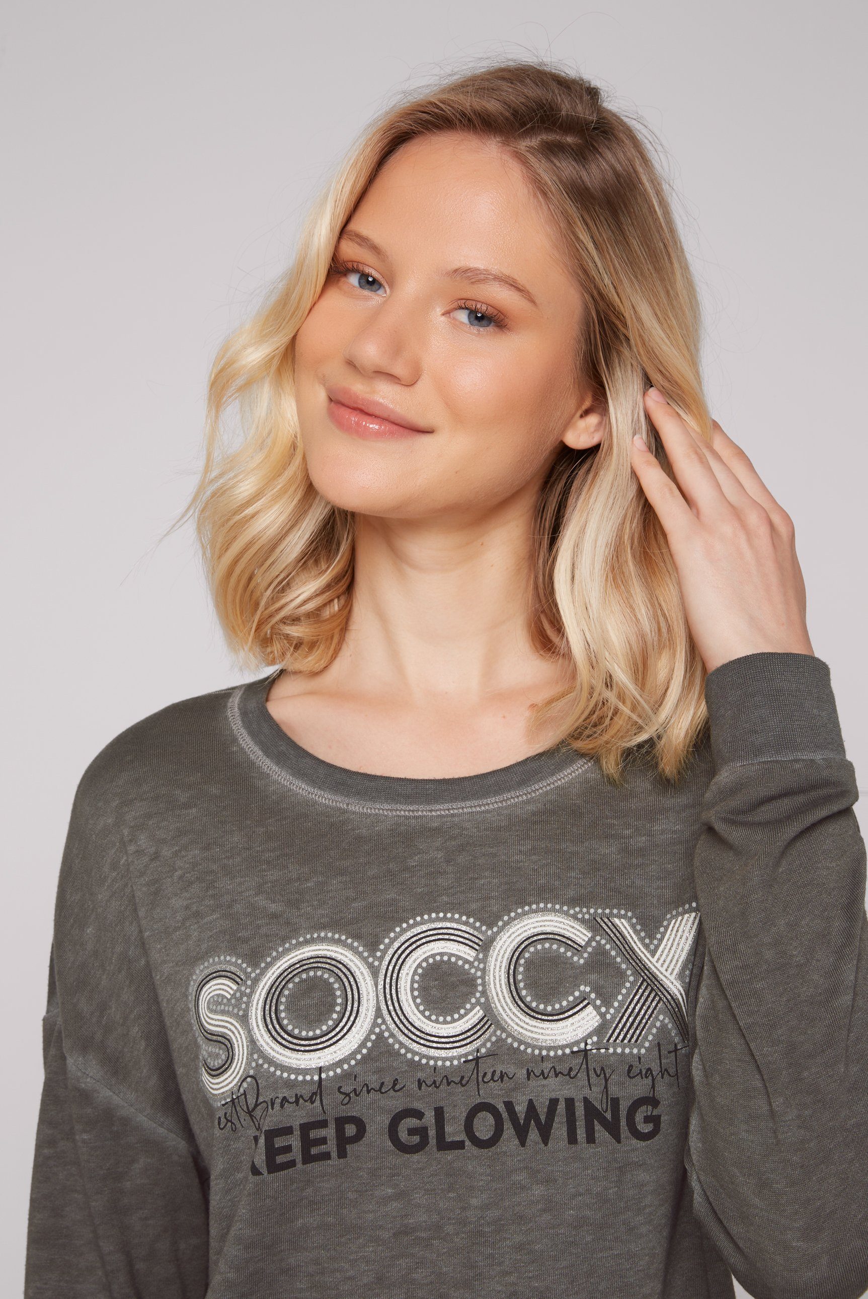 Ausbrenner-Effekten mit SOCCX Sweater
