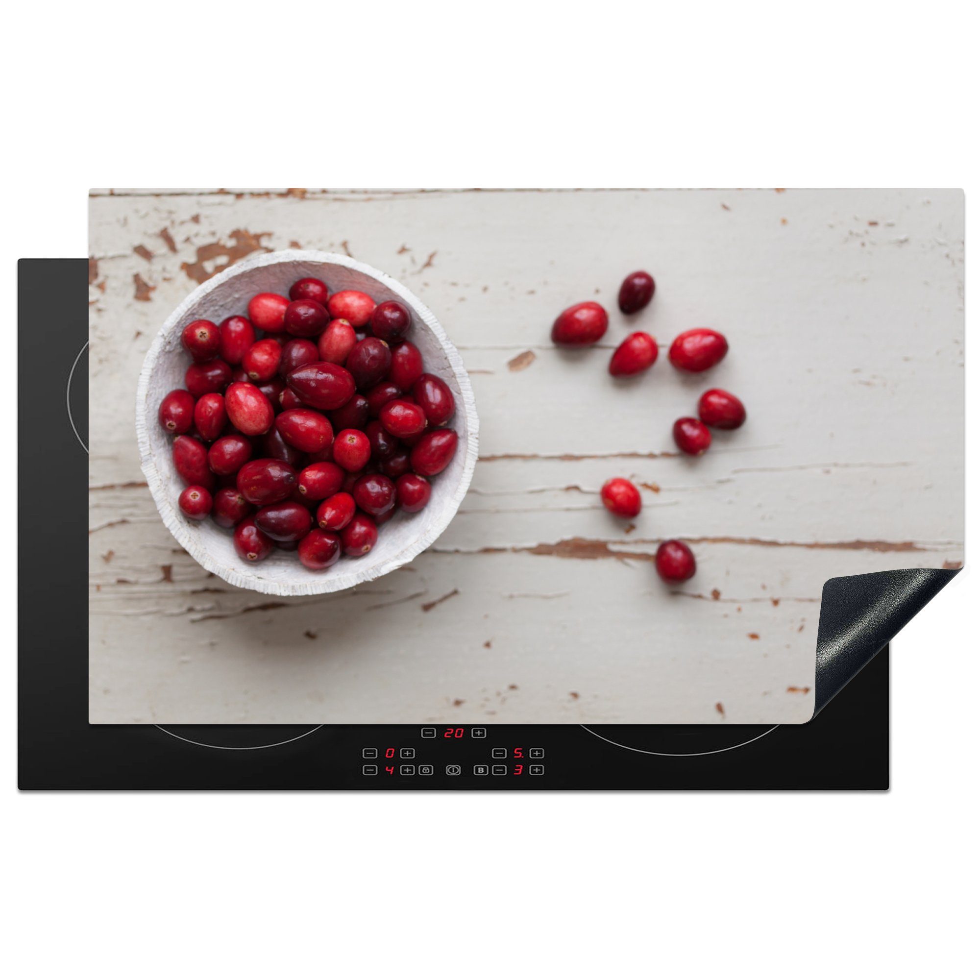 MuchoWow Herdblende-/Abdeckplatte Weiße Schale mit roten Preiselbeeren, Vinyl, (1 tlg), 83x51 cm, Ceranfeldabdeckung, Arbeitsplatte für küche