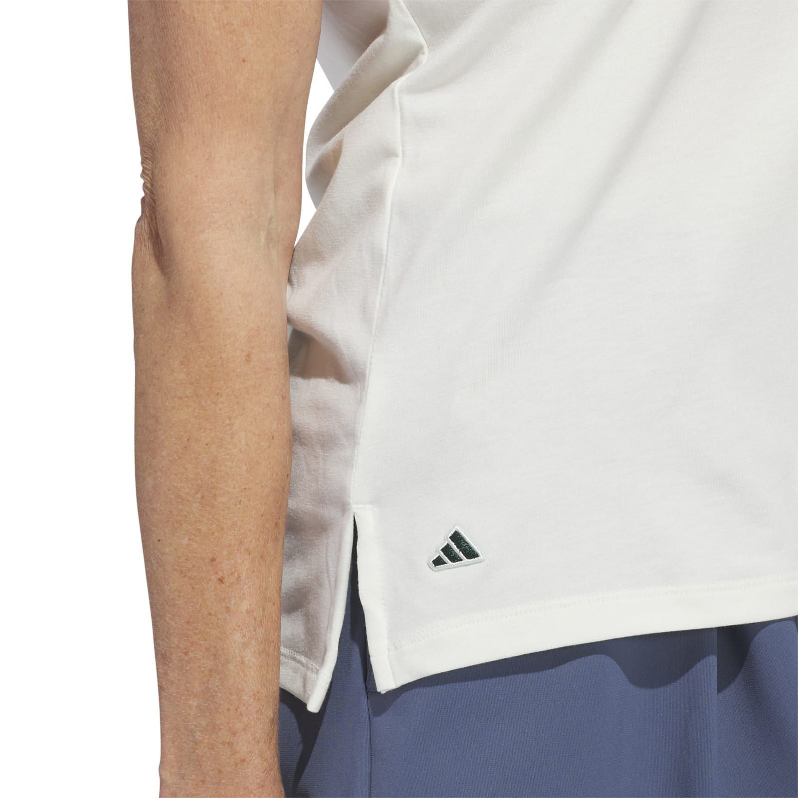 adidas Sportswear Poloshirt adidas GO-TO HEATHERED POLOSHIRT Damen (1-tlg) EIN GOLFPOLOSHIRT MIT SEITLICHEN SCHLITZEN UND RECYCELTEN MATERIALIEN.