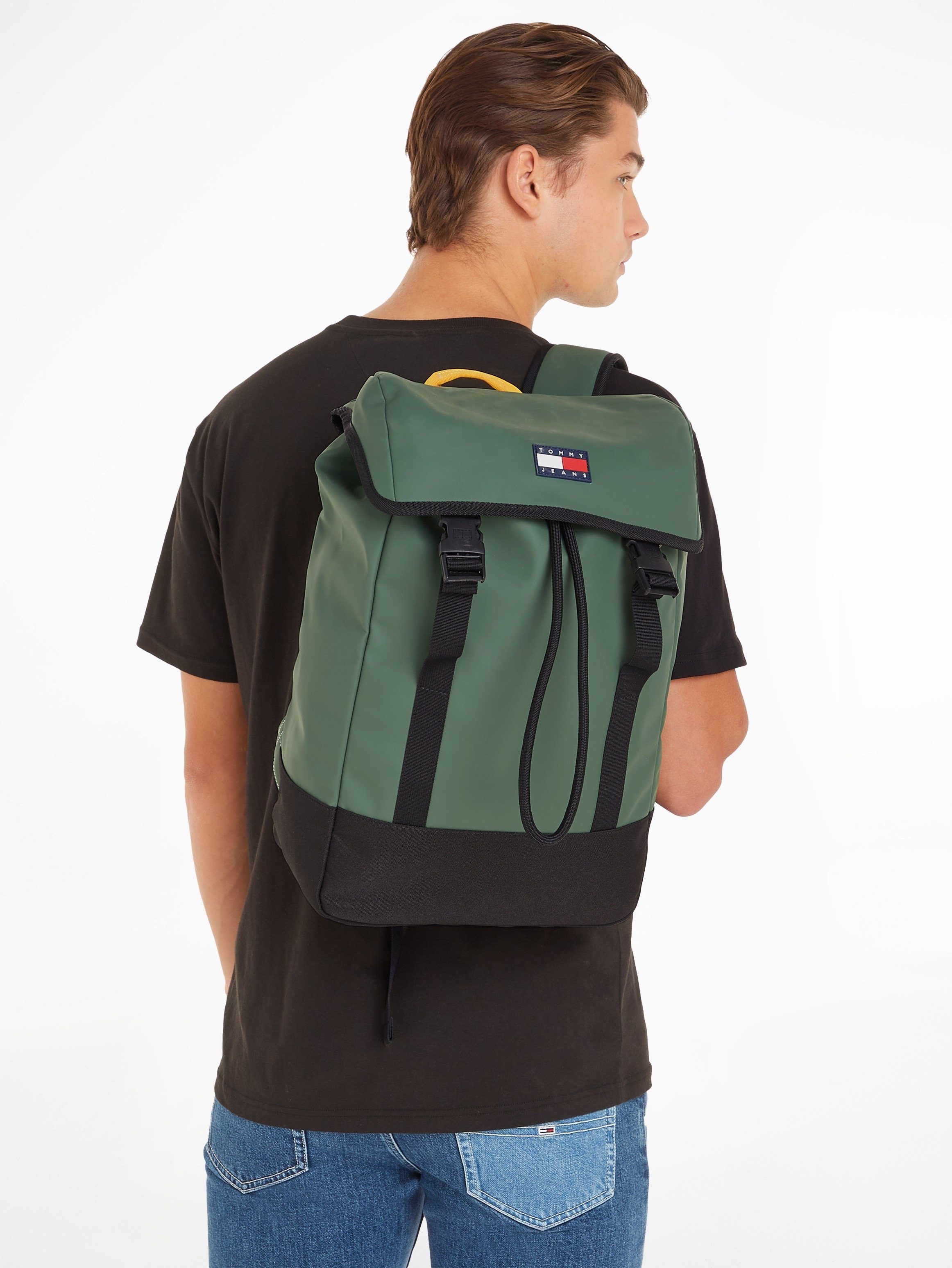 Cityrucksack Tommy Look BACKPACK, im FUNCTION grün TJM FLAP sportlichen Jeans