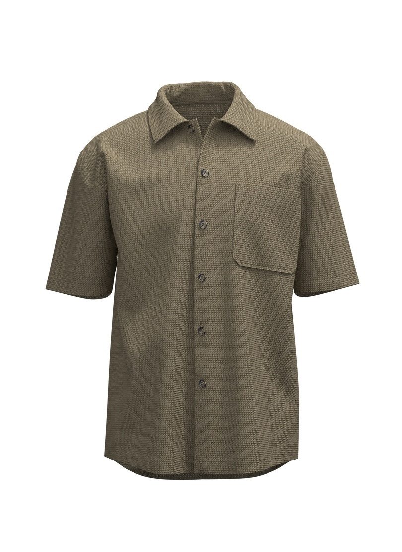 Trigema Blusenshirt TRIGEMA Polohemd in Waffel-Optik (1-tlg)