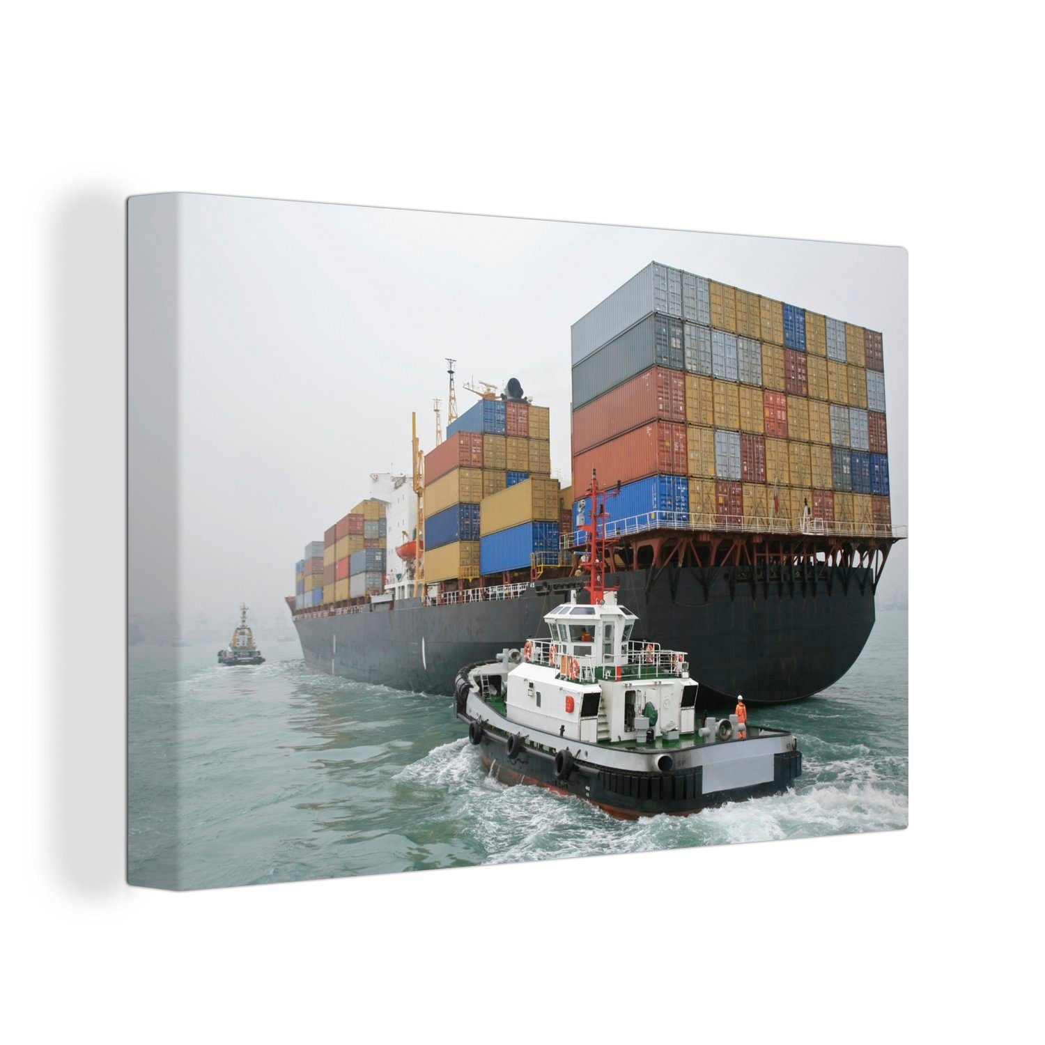 OneMillionCanvasses® Leinwandbild Schlepper fährt neben einem Containerschiff her, (1 St), Wandbild Leinwandbilder, Aufhängefertig, Wanddeko, 30x20 cm