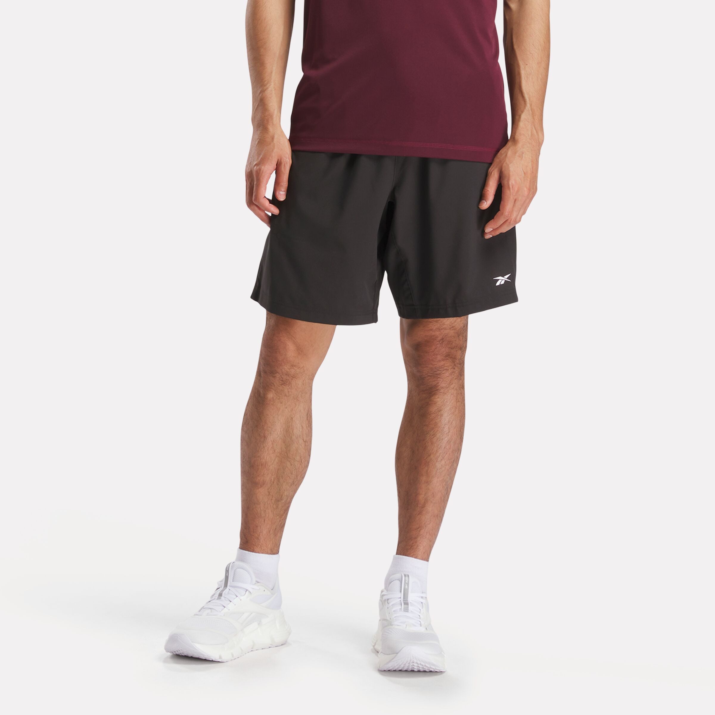 Reebok Trainingsshorts WOR WOVEN SHORT kurze Trainingsshorts, ca. Mitte Oberschenkel geschnitten