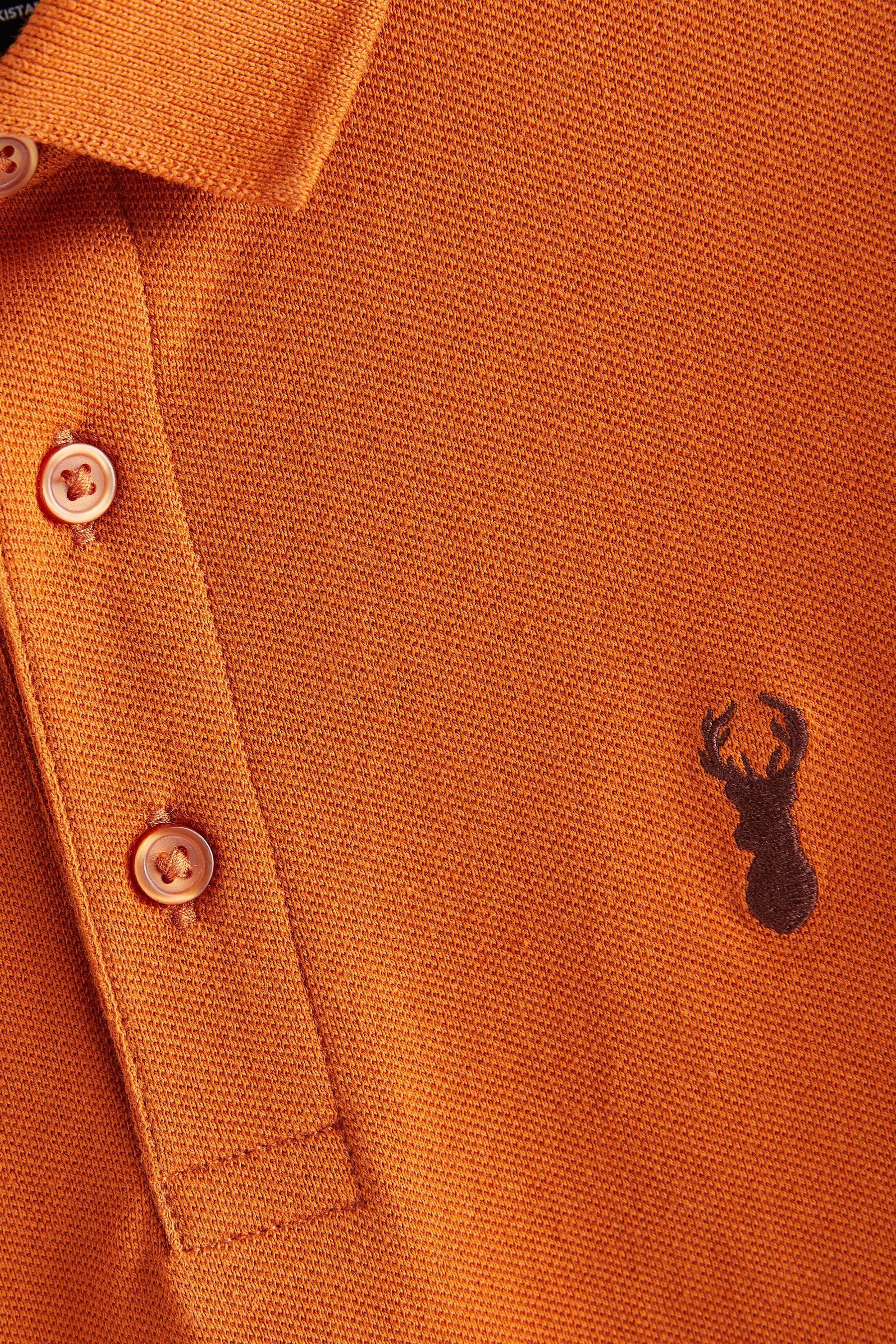 Next (1-tlg) Orange Burnt Kurzärmeliges Poloshirt Polo-Shirt